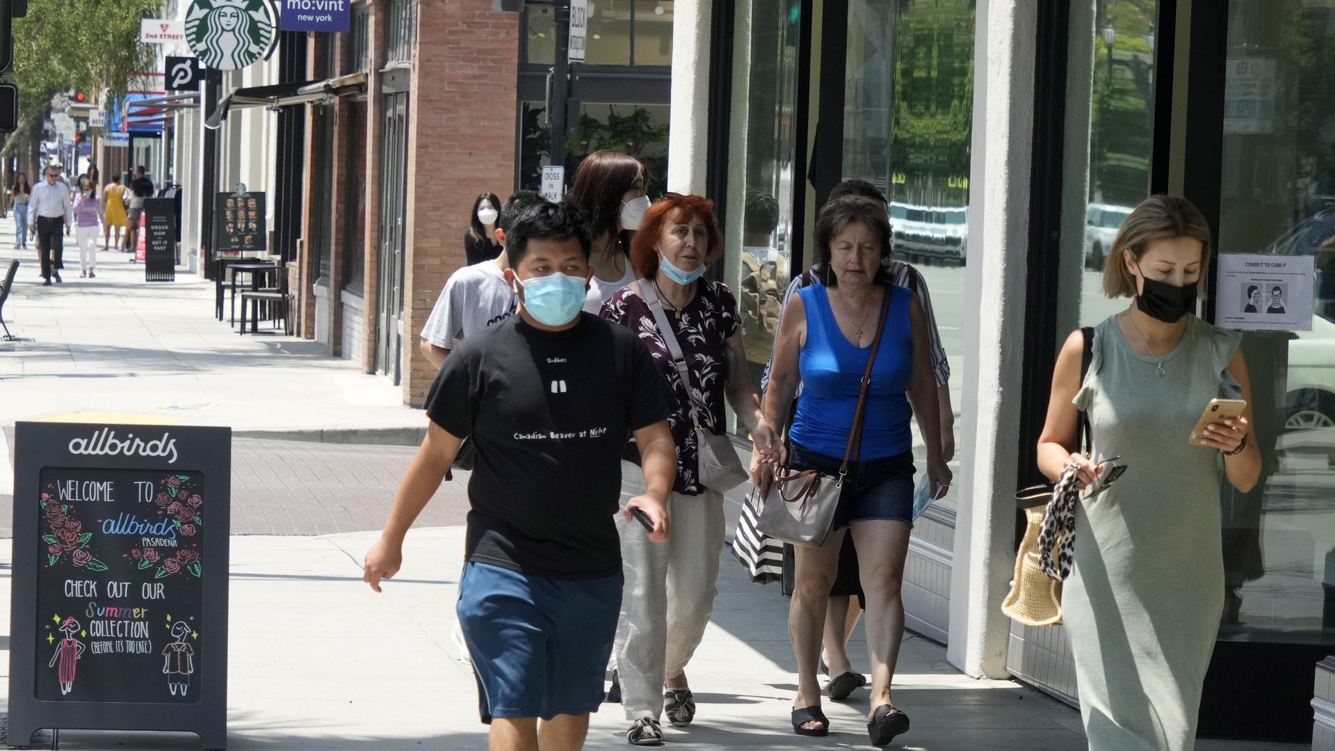 People walking in Pasadena, California, on July 23.