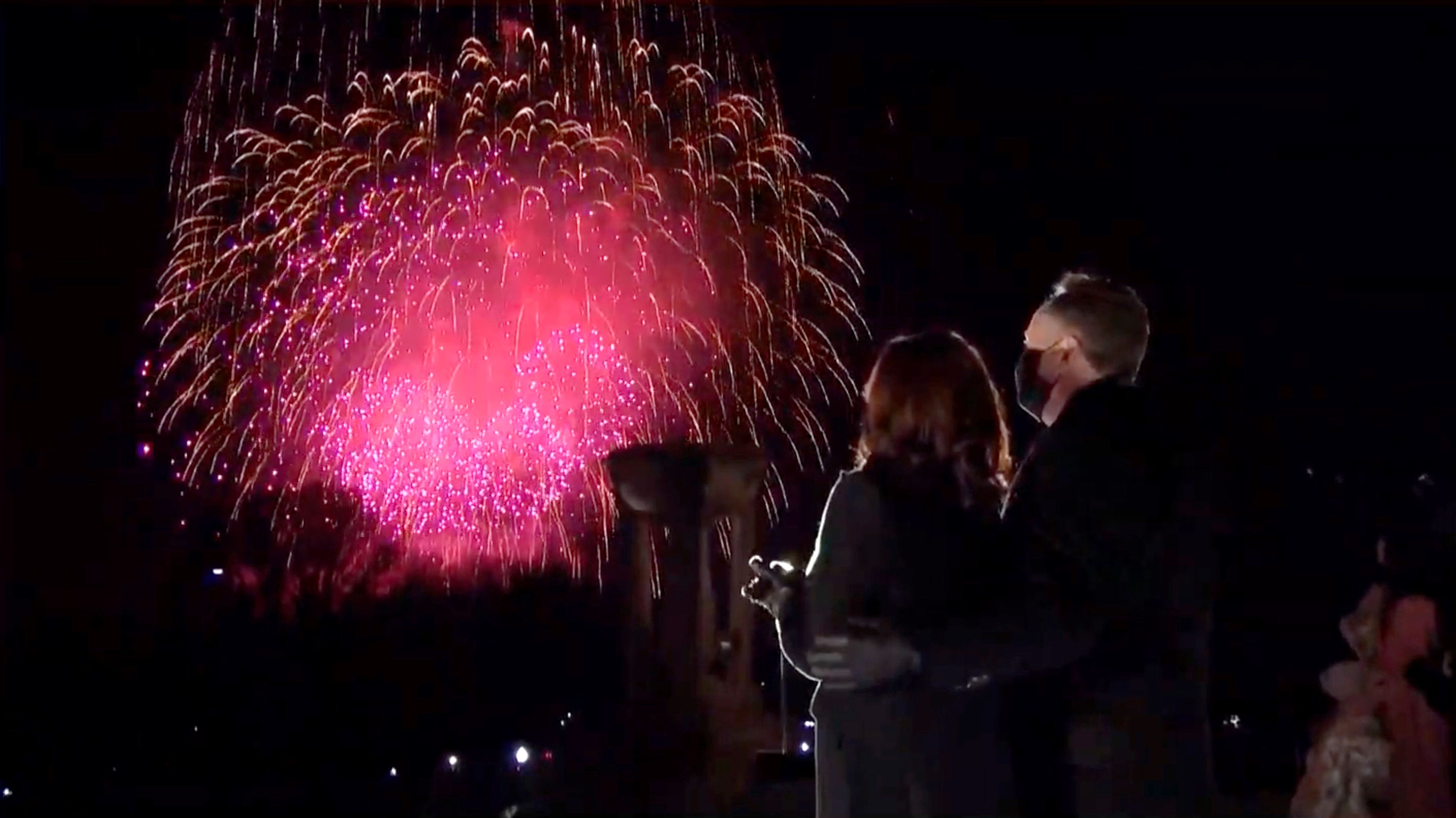  In this screengrab, Vice President Kamala Harris and Doug Emhoff watch fireworks during the Celebrating America Primetime Special on January 20