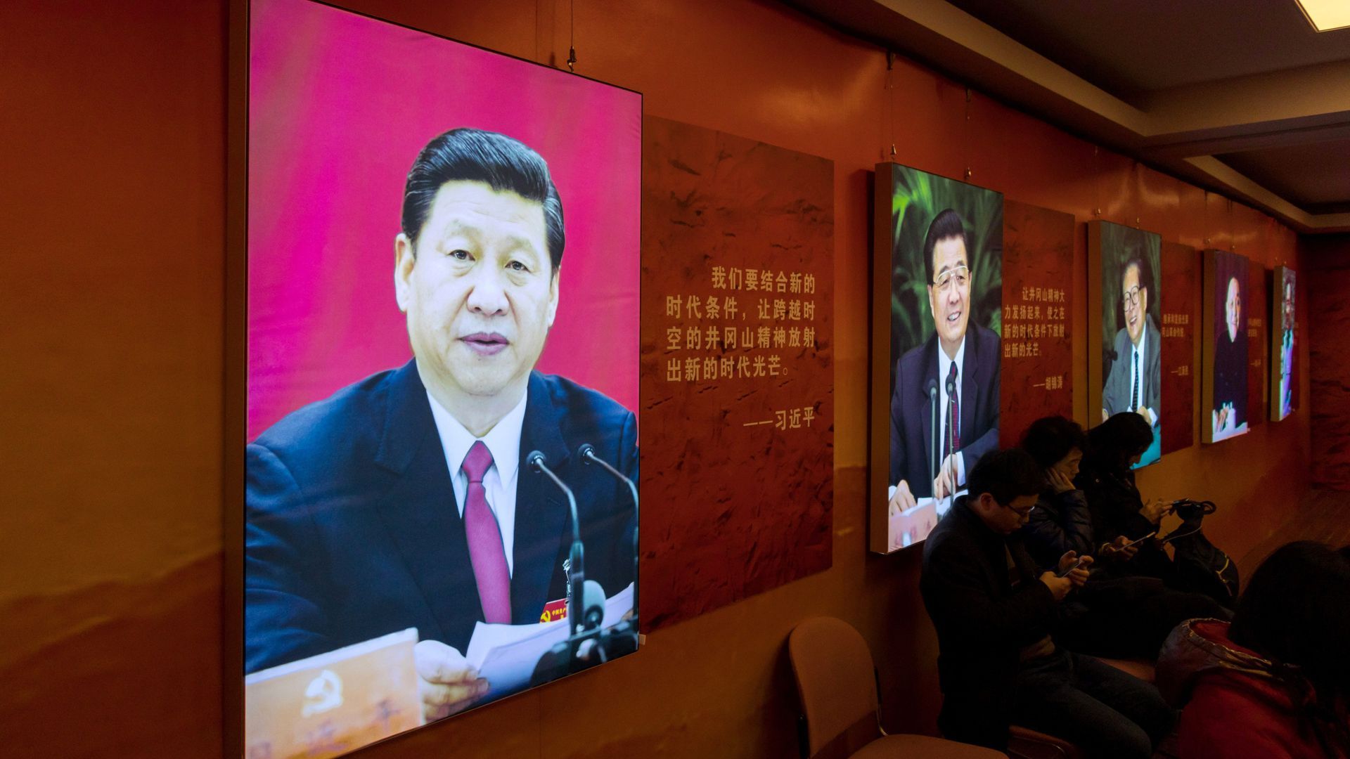 An image of China's President Xi Jinping is seen on an exhibition. 