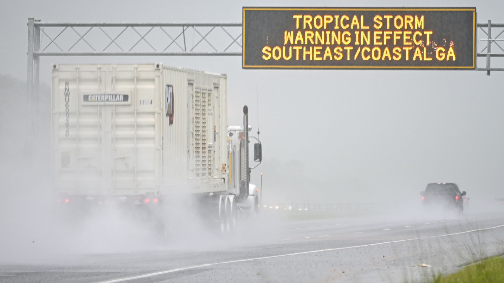truck driving through storm