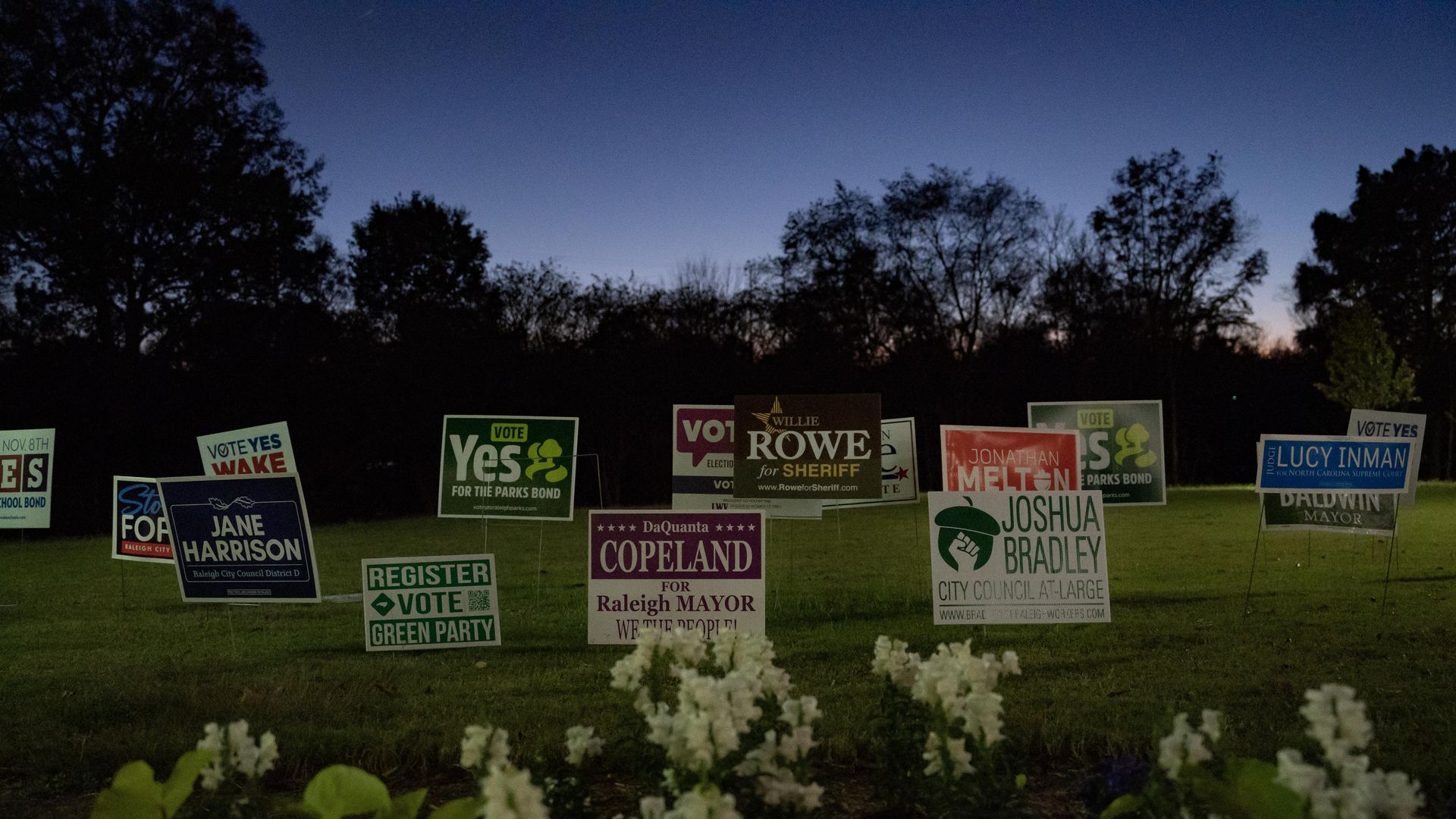 RALEIGH, NC - NOVEMBER 08: Signs are seen outside a polling place on November 8, 2022 in Raleigh, North Carolina, United States. After months of candidates campaigning, Americans are voting in the midterm elections to decide close races across the nation. (Photo by Allison Joyce/Getty Images)