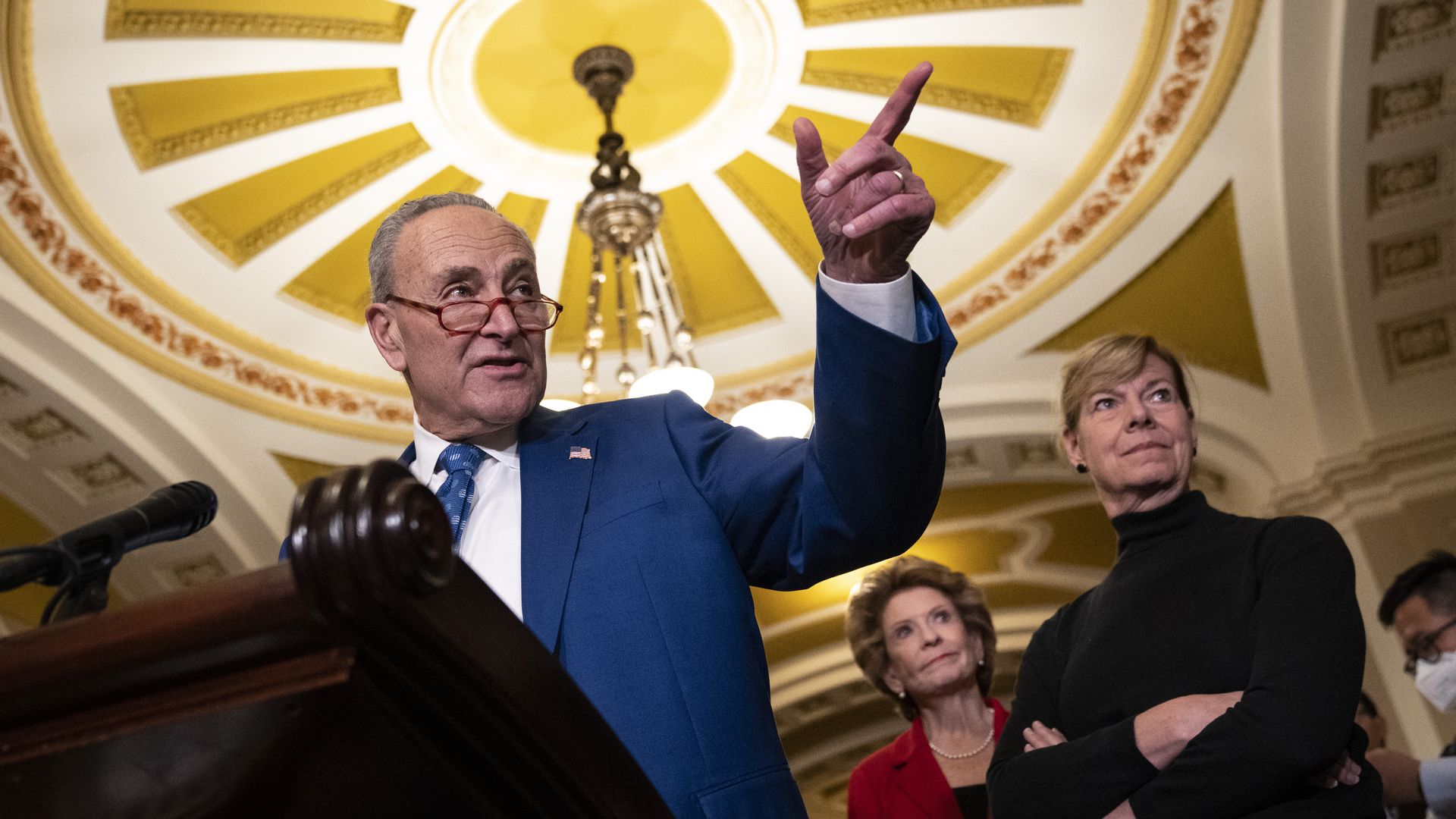 Senate Majority Leader Chuck Schumer and Sens. Debbie Stabenow and Tammy Baldwin at a press conference.