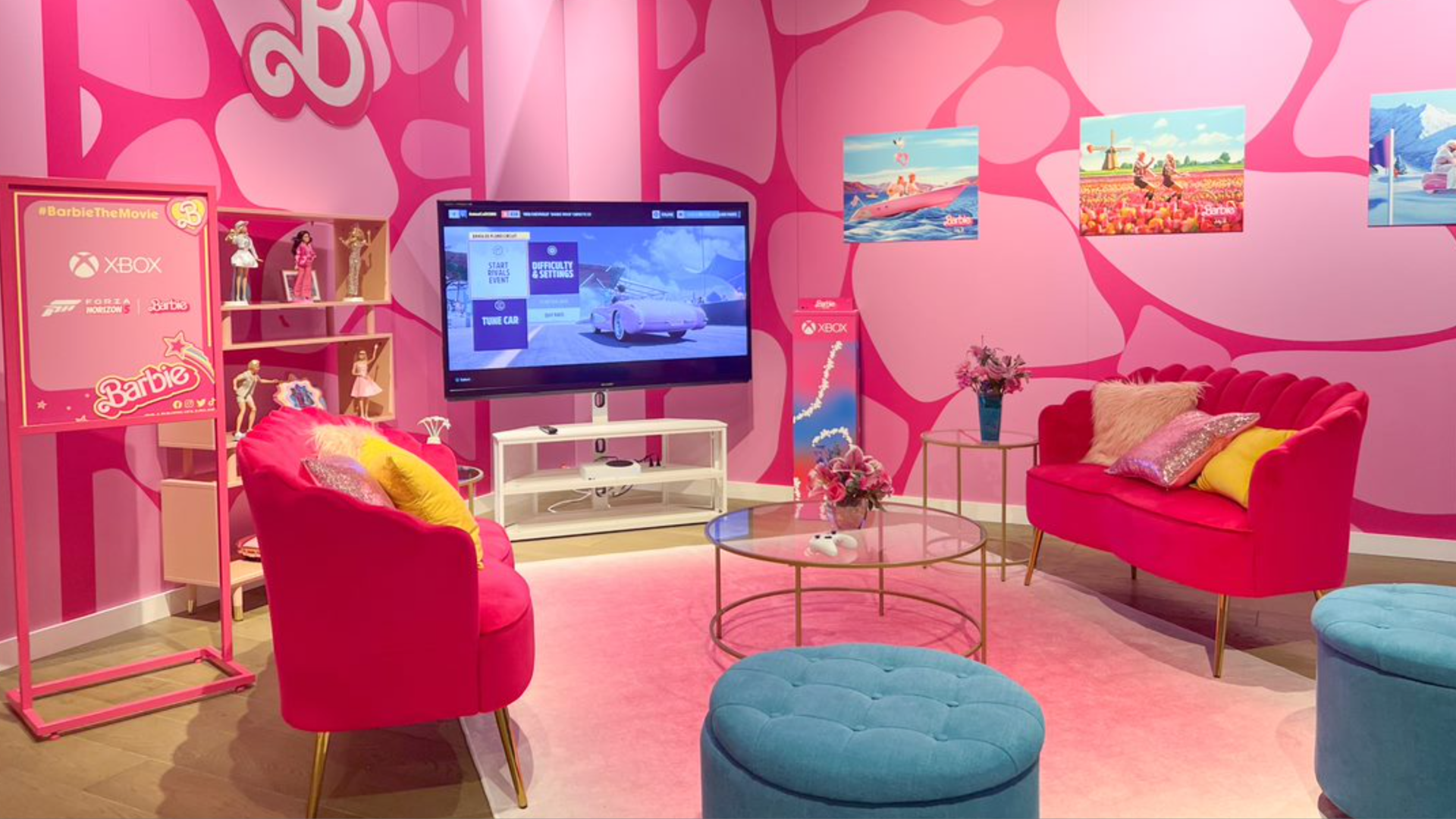 A hot pink room styled like Barbie's dream house.