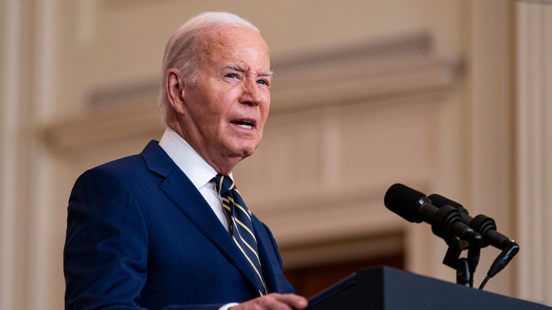President Joe Biden speaks in the East Room of the White House in Washington, DC.