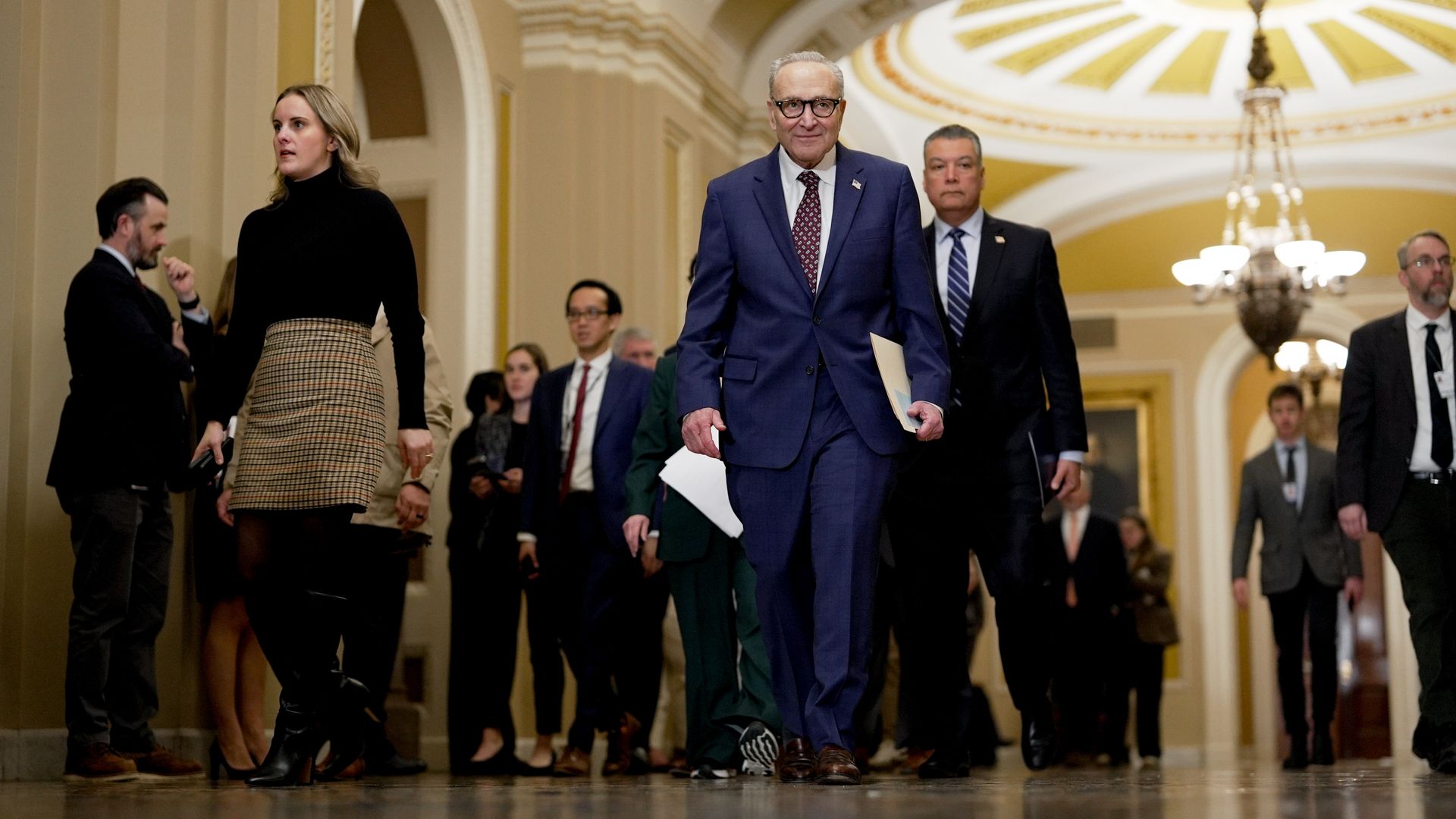 Senate Minority Leader Chuck Schumer, a Democrat from New York, center, and Senator Alex Padilla, a Democrat from California, center right, arrive for a news conference following the weekly Senate Democrat policy luncheon at the US Capitol in Washington, DC, US, on Wednesday, Jan. 28, 2026. 