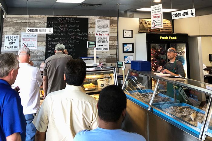 ordering-seafood-at-po-boys-charlotte