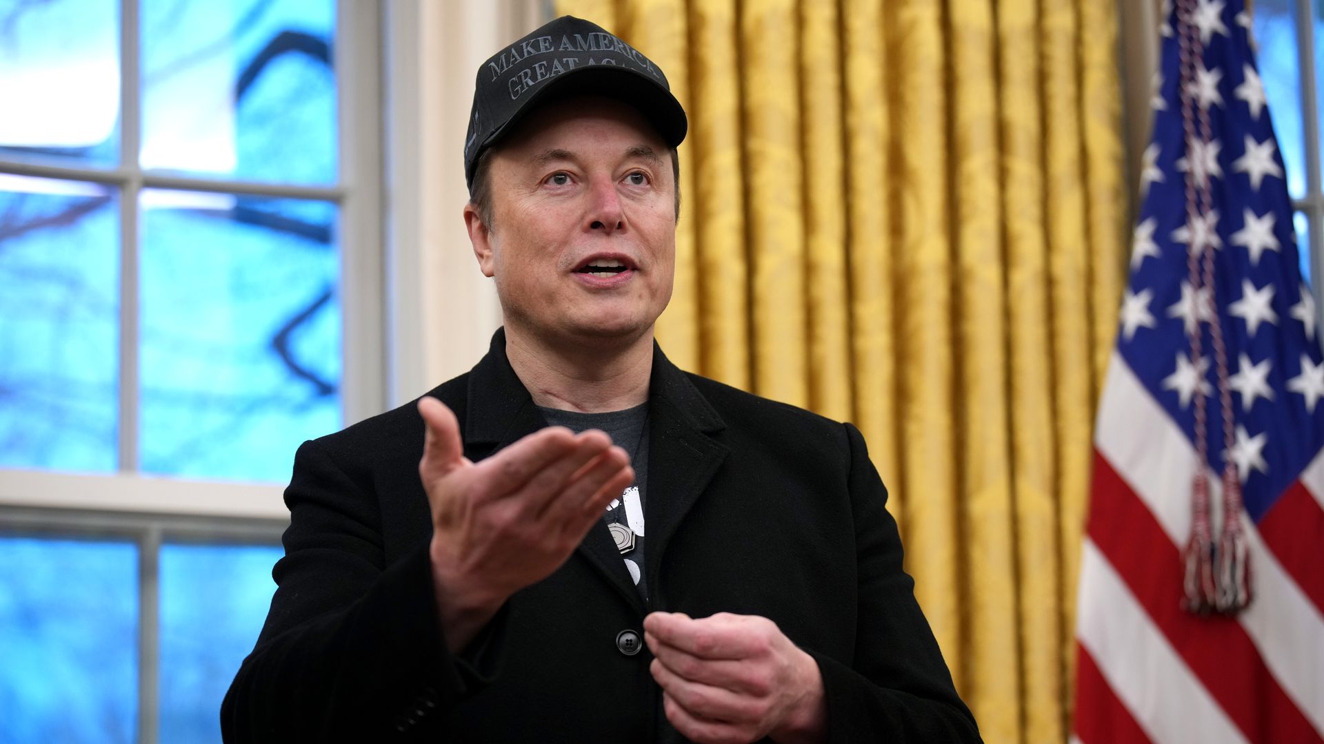 Tesla and SpaceX CEO Elon Musk delivers remarks as he join U.S. President Donald Trump during an executive order signing in the Oval Office at the White House on February 11, 2025 in Washington, DC. 
