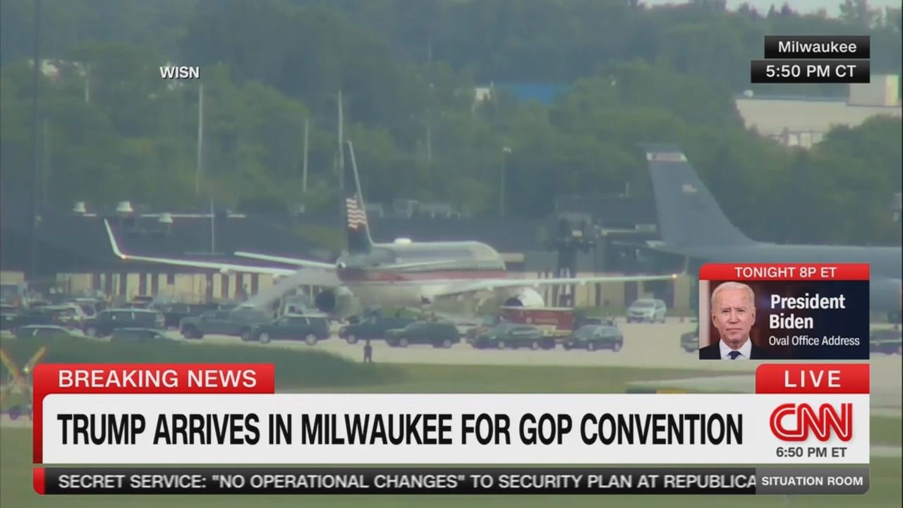 A screenshot of CNN showing former President Trump's plane in Milwaukee.