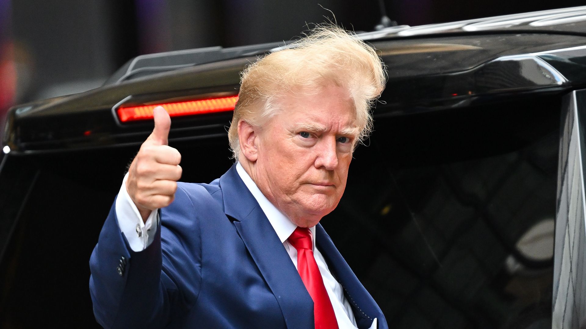 Donald Trump leaves Trump Tower
