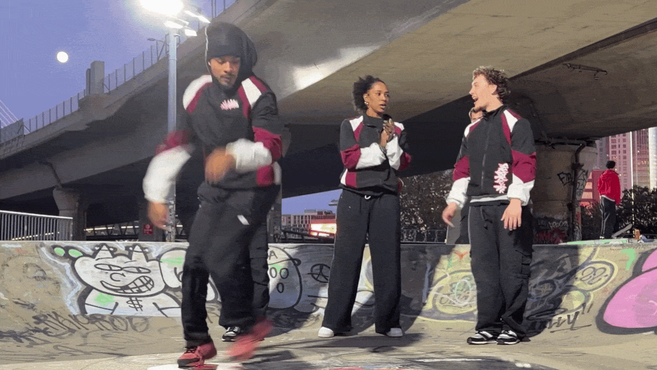 Members of the Boston breakdance group the Floor Lords clap and step to a beat as another member break dances in front of them at Lynch Family Skatepark in Cambridge on Thursday, Sept. 24, 2026.