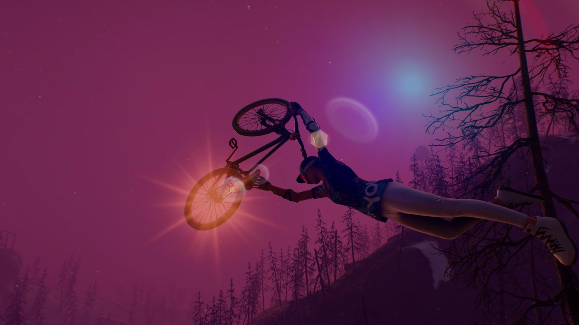 Video game screenshot of a dirt-bike and its rider in mid-air in front of a purple sky