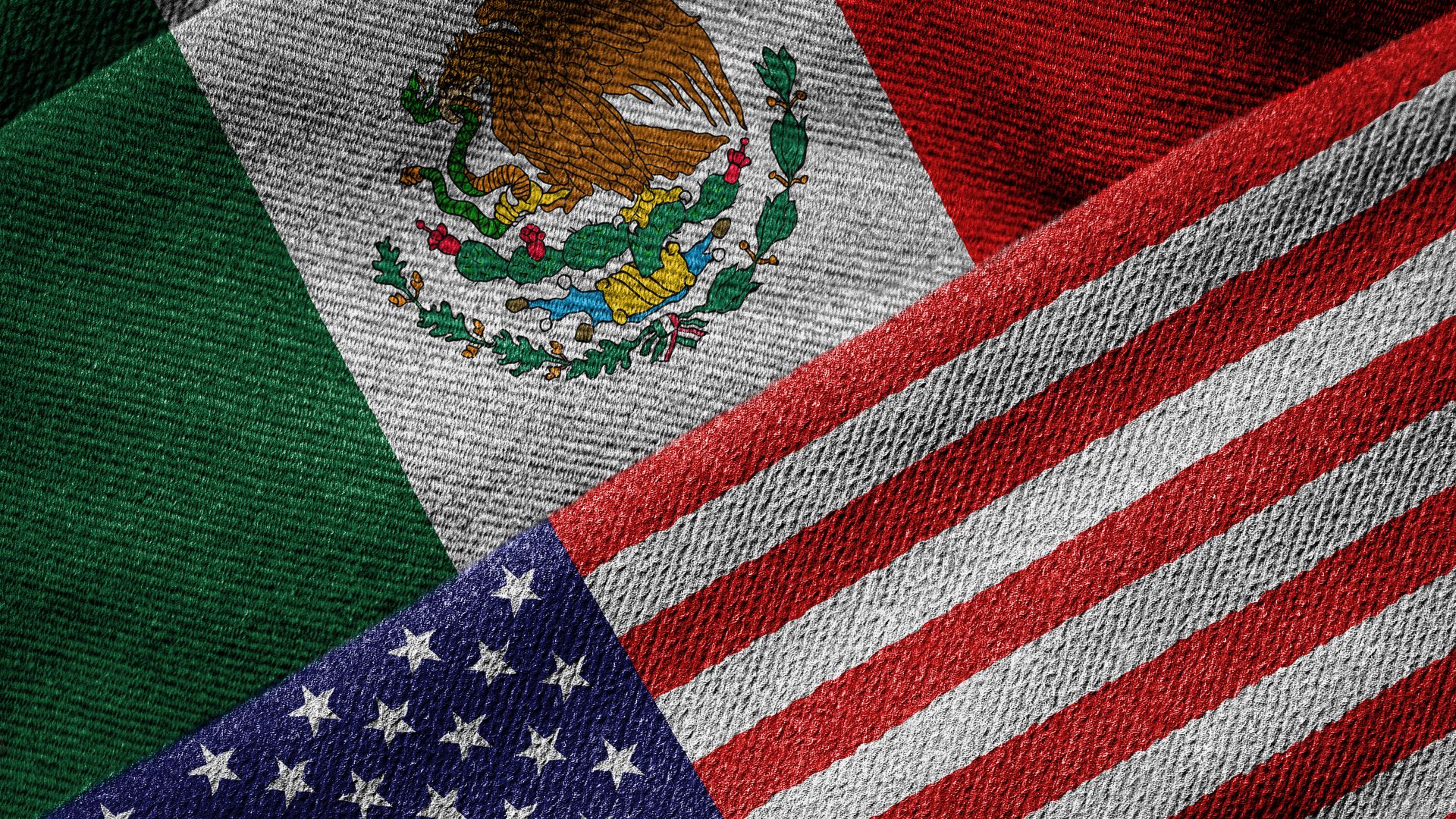 Mexican and American flags side by side