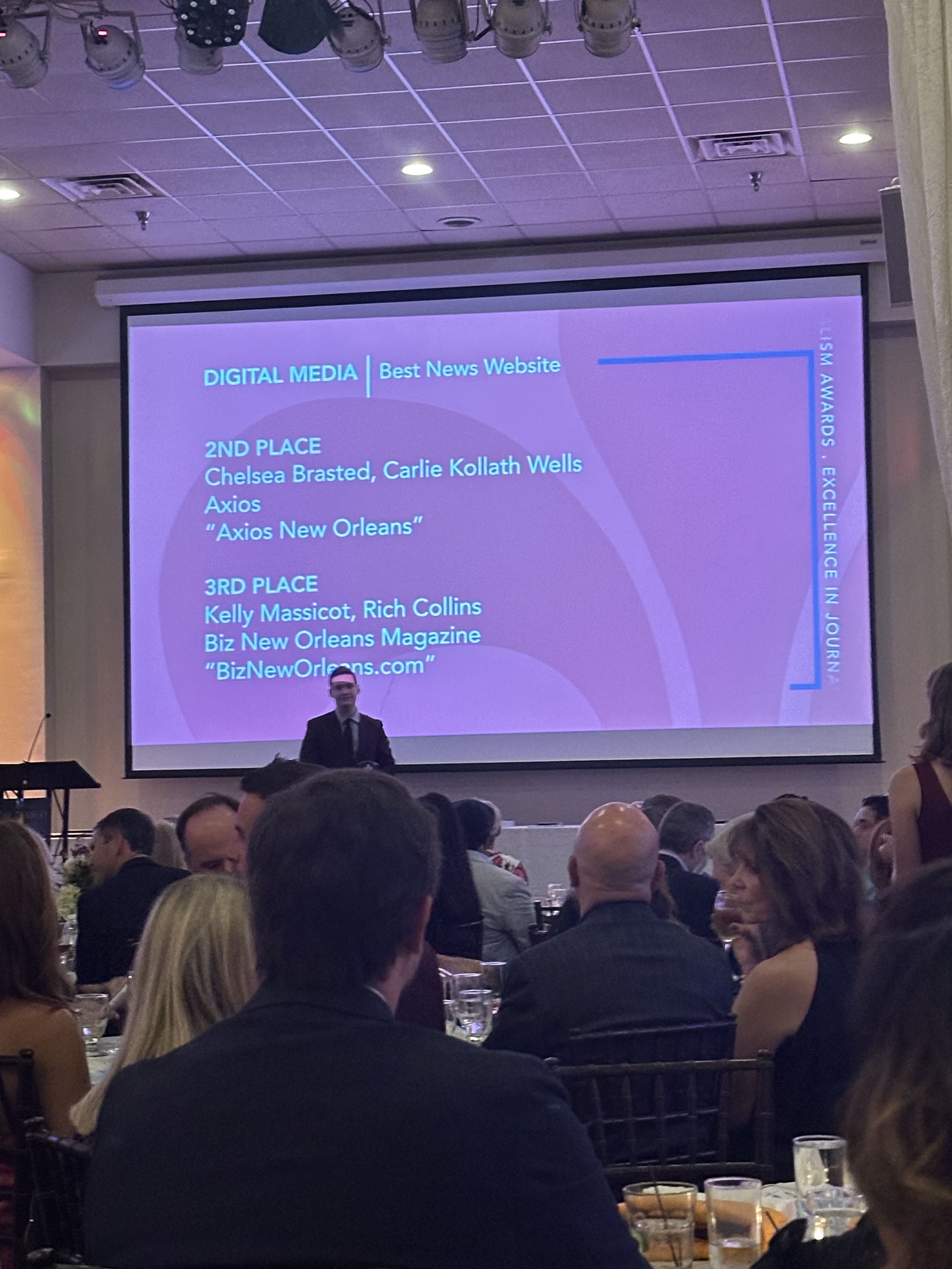 Photo shows a screen with Axios winning 2nd for best news website.