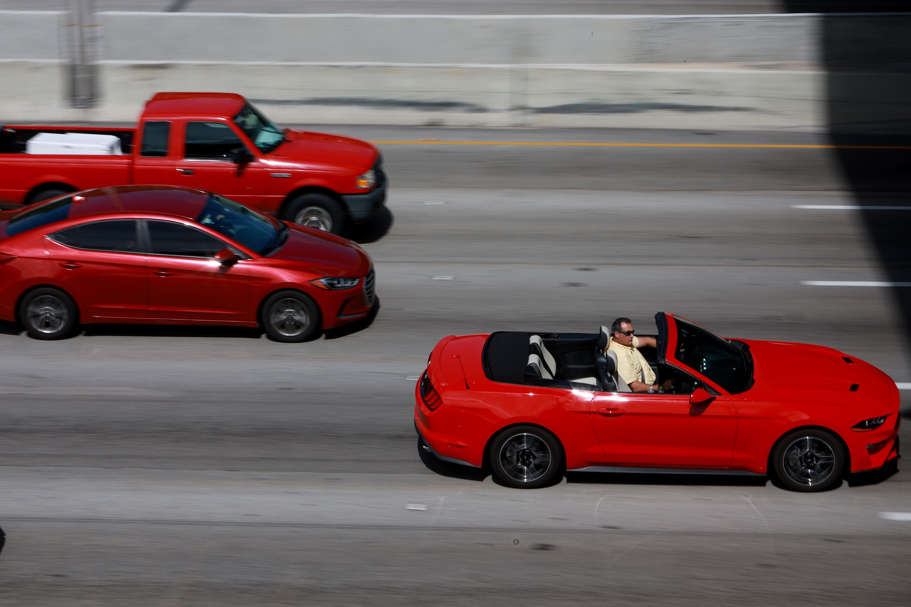 MIAMI, FLORIDA - JUNE 30: Vehicles are driven along I-95 on June 30, 2022 in Miami, Florida. According to a report from AAA for the July 4 holiday weekend, they forecast that 42 million Americans, the most ever, will take a road trip of 50 miles or more. (Photo by Joe Raedle/Getty Images)