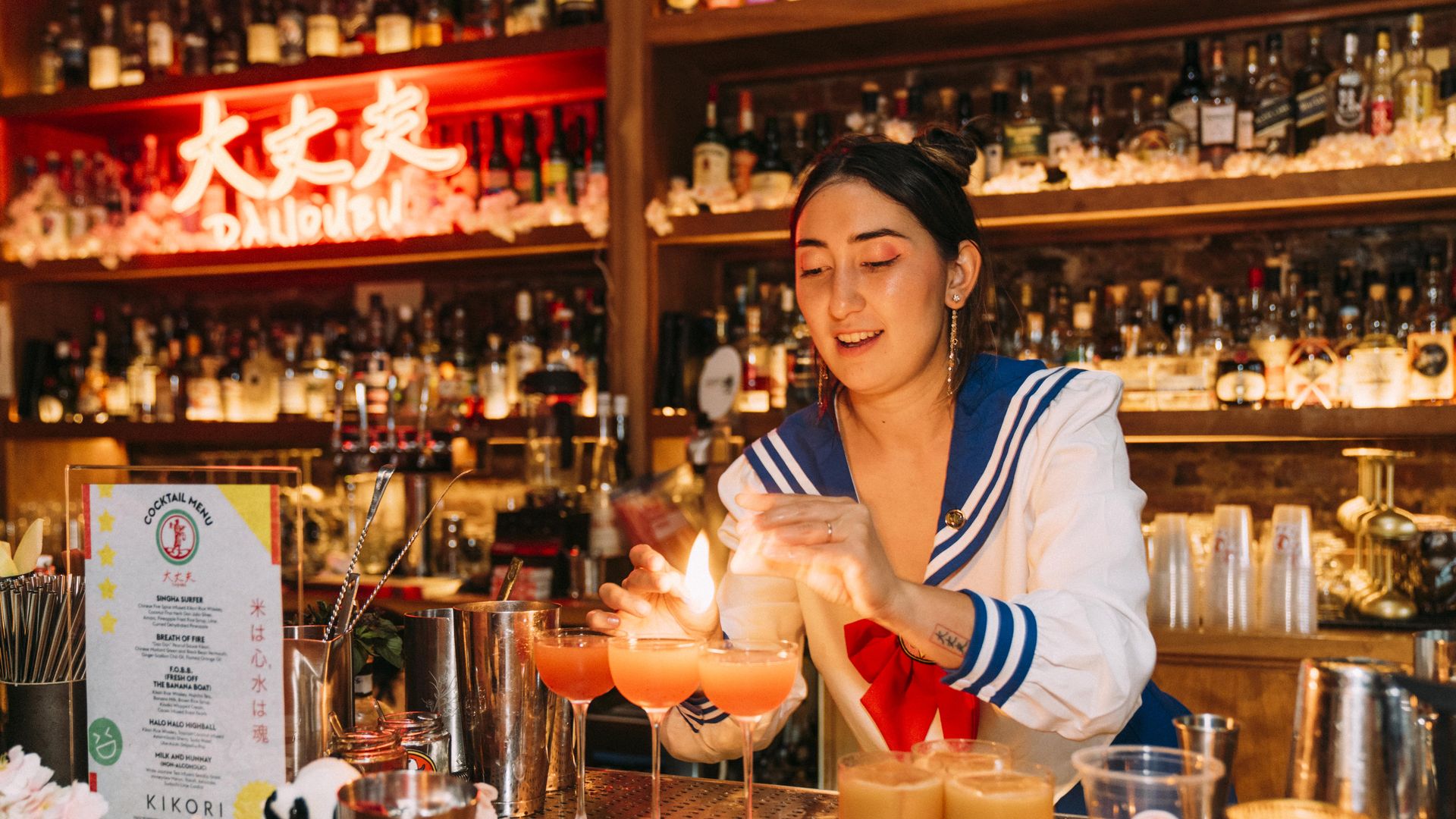 A bartender at PCH in San Francisco makes a cocktail.