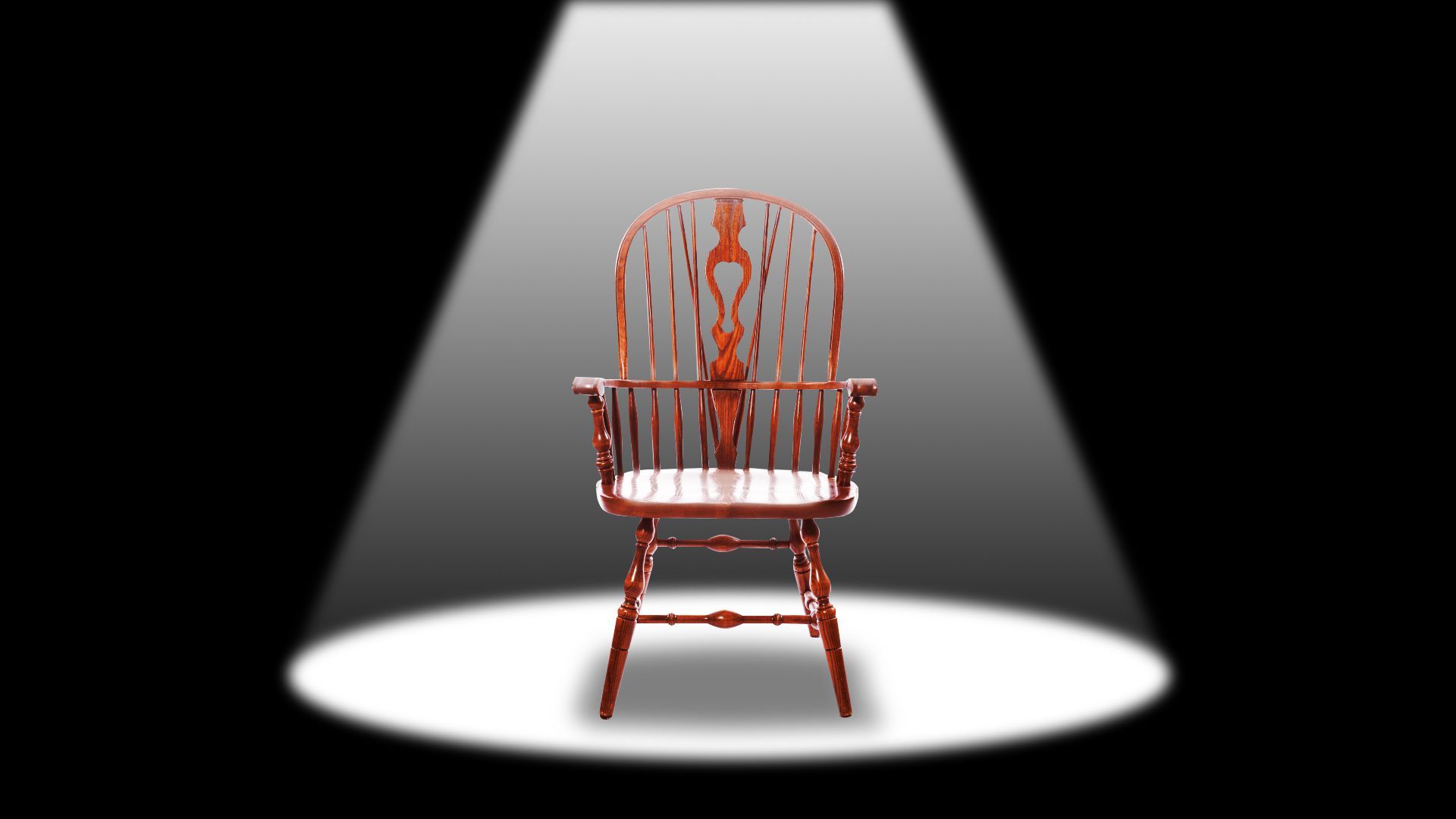 Illustration of a lone supreme court chair under a spotlight. 