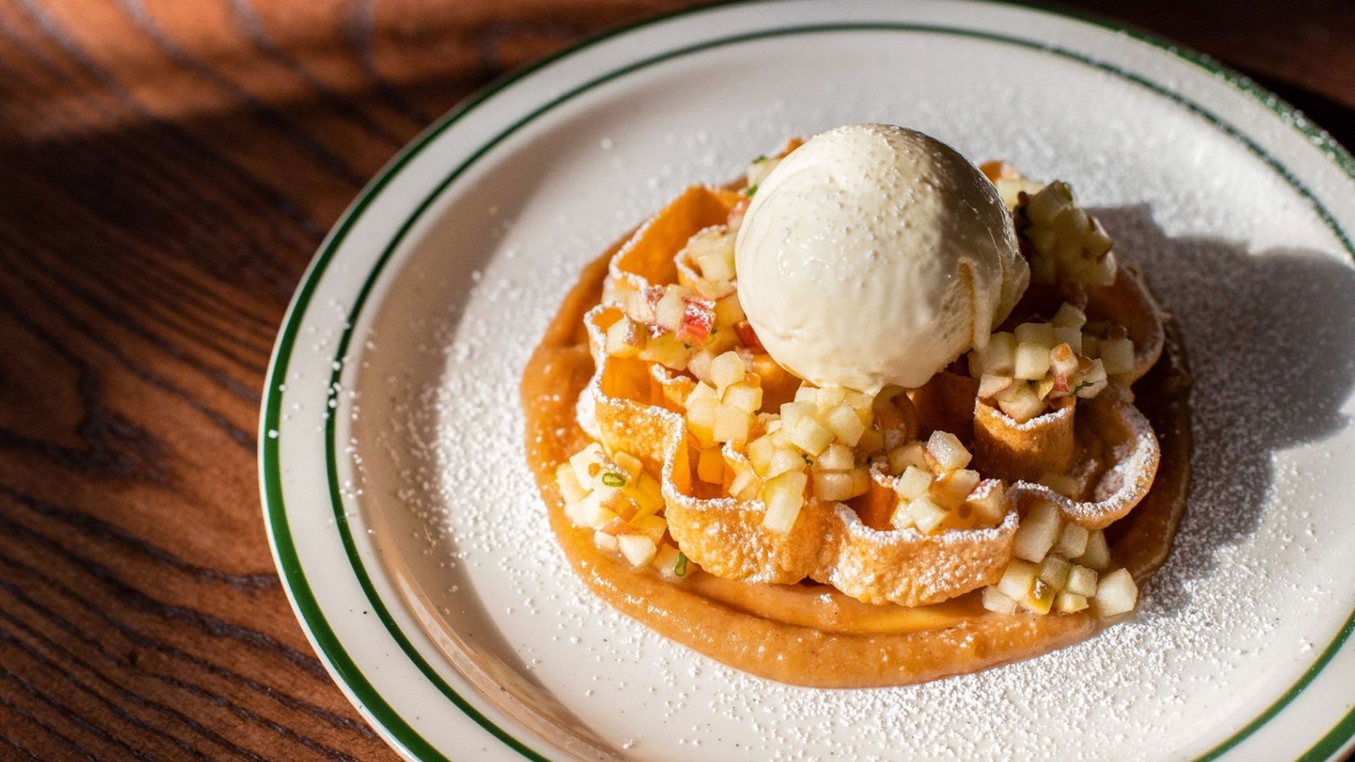 The Rosette dessert at Alpino in Corktown: vanilla fritter with apple butter, apple relish and Guernsey's ice cream. Photo: Courtesy of Perry Haselden
