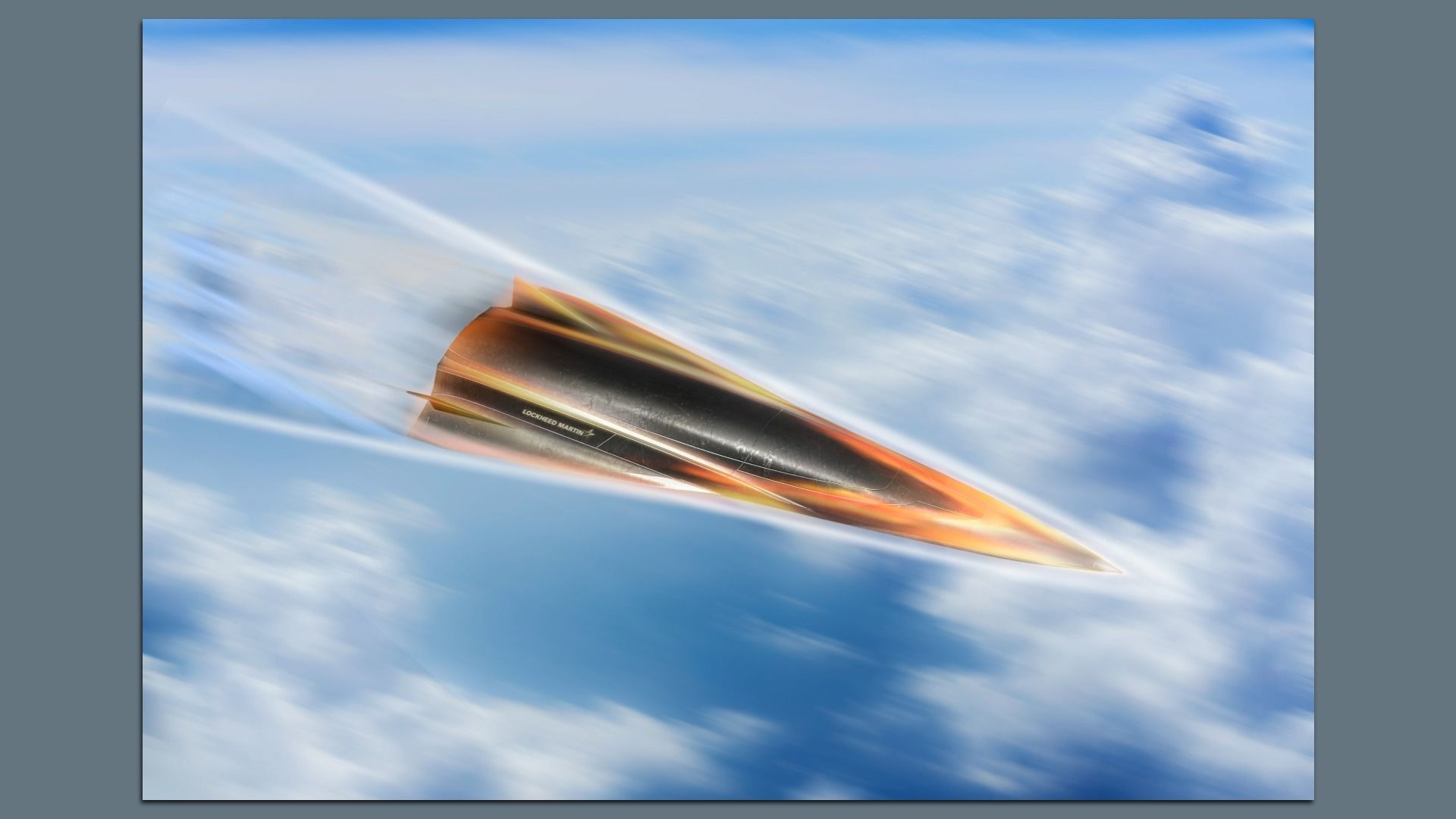 A fast orange and black rocket slices through a blue sky with wispy white clouds; long motion blur trails behind, with Lockheed Martin branding along the fuselage.