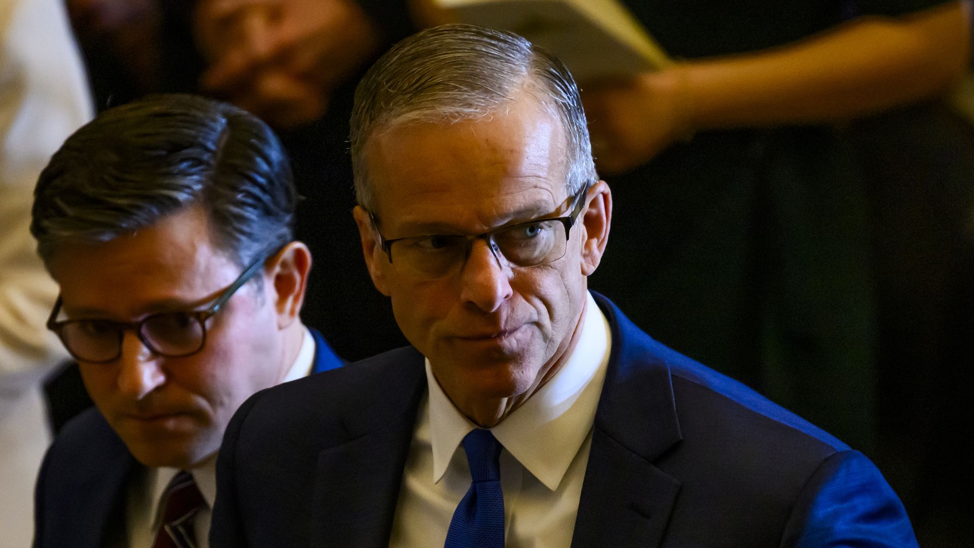 Representative Mike Johnson, a Republican from Louisiana, left, and Senator John Thune, a Republican from South Dakota, right
