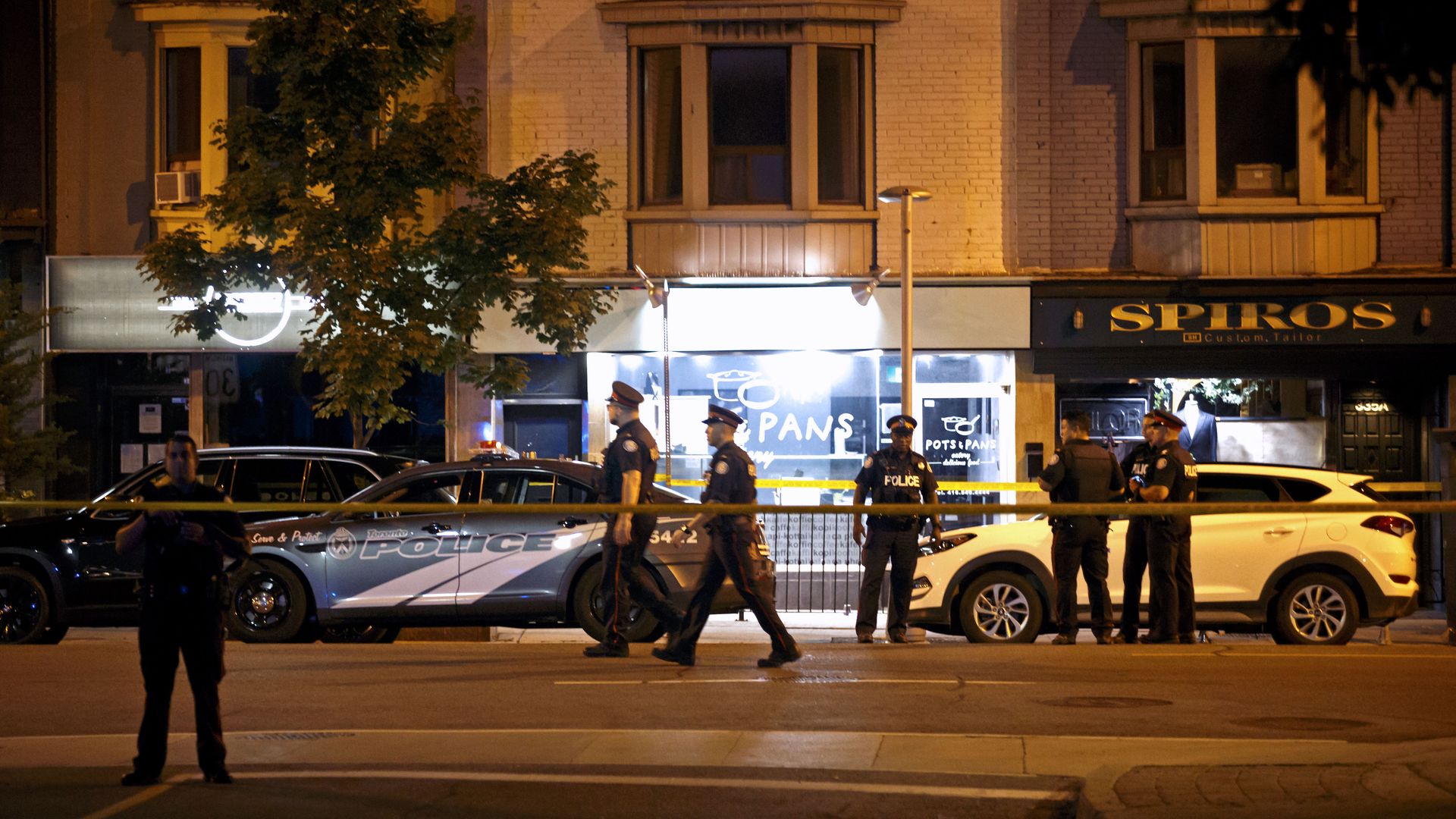 Police secure a shooting scene in Toronto