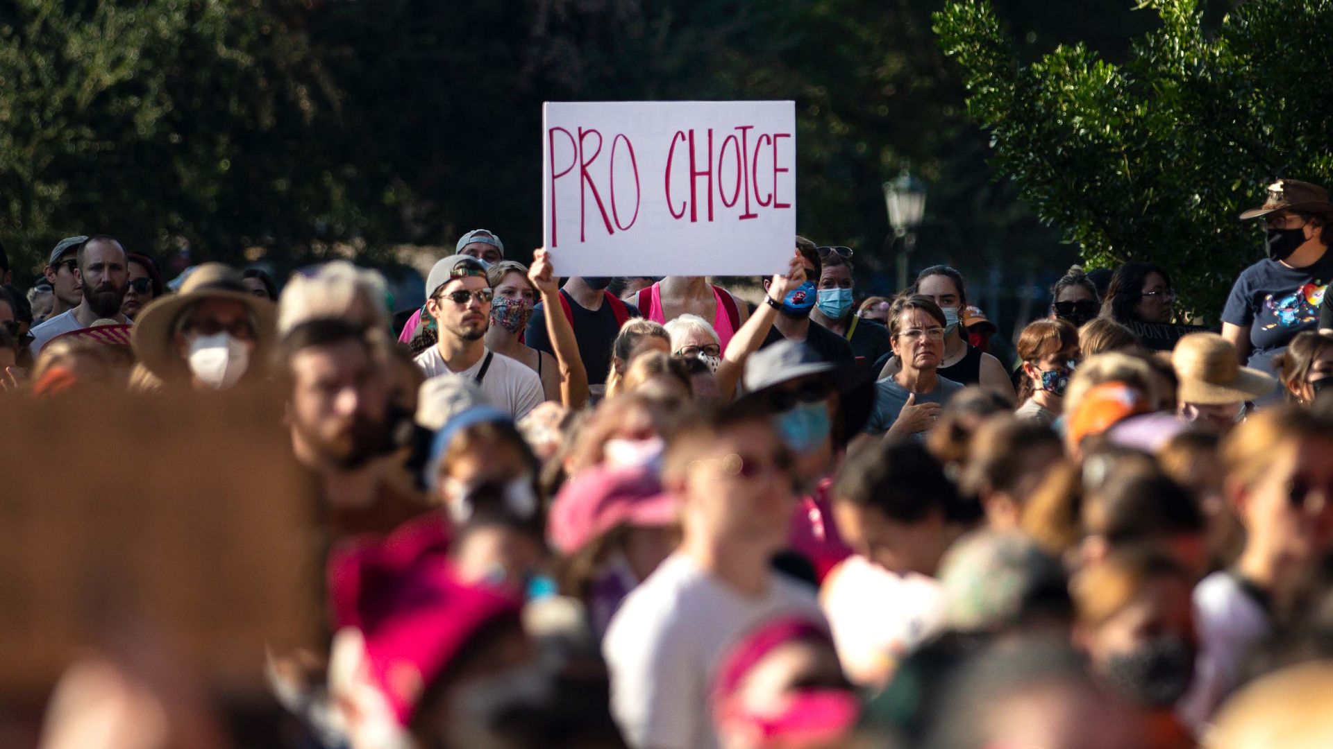 People protesting Texas' abortion ban outside of the Texas State Capitol in Austin on Oct. 2.