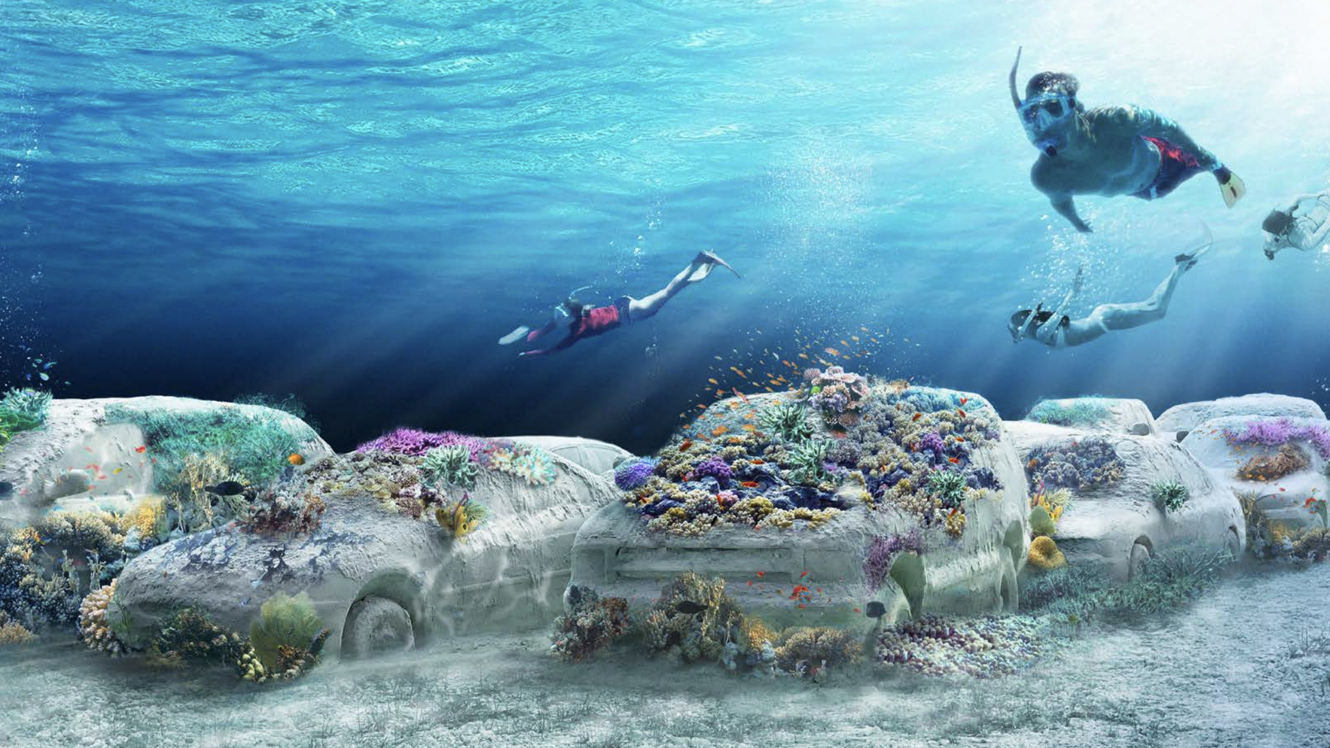 A rendering of snorklers underwater swimming by cars made of sand.