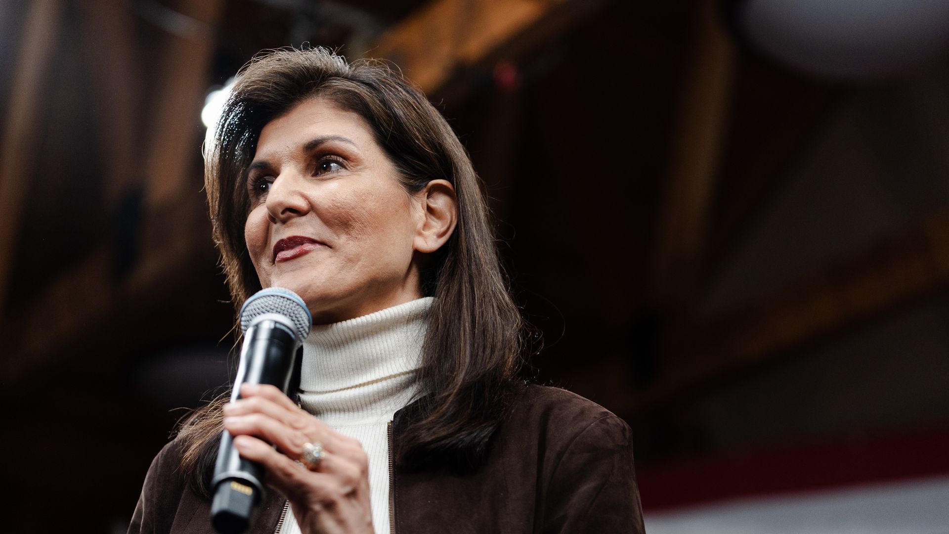  Republican presidential candidate Nikki Haley speaks to supporters after receiving the endorsement of New Hampshire Gov. Chris Sununu during a Town hall event at McIntyre Ski Area on December 12, 2023 in Manchester, New Hampshire. 