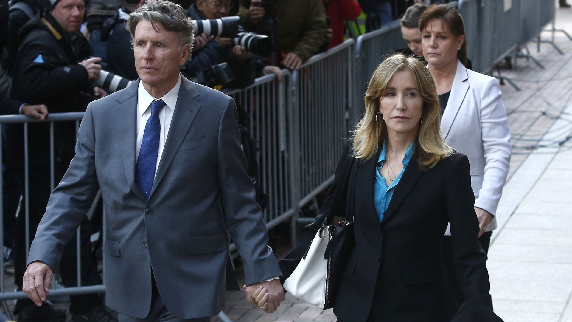 Actress Felicity Huffman with her husband outside Boston courthouse