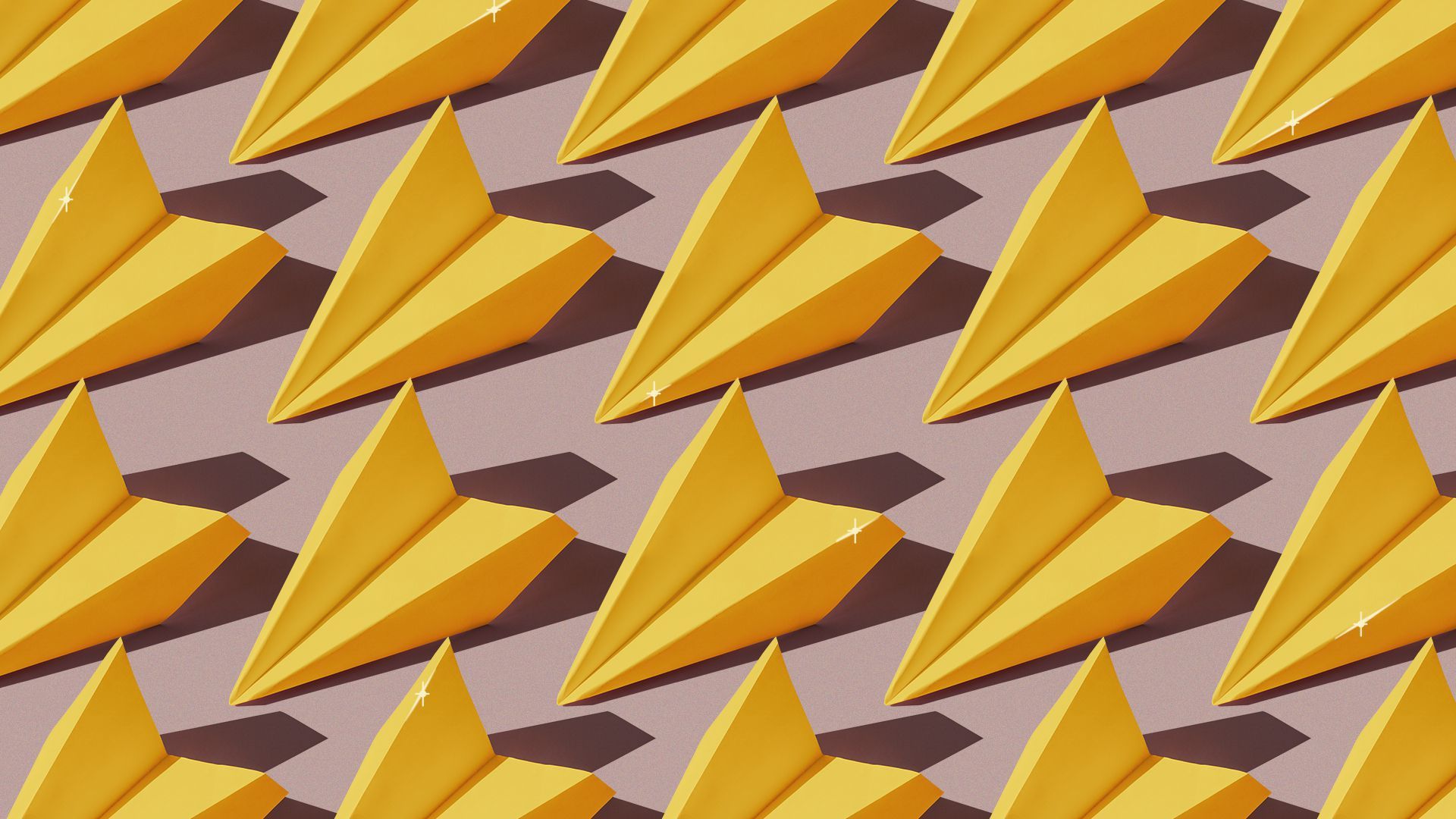 A group of golden paper airplanes