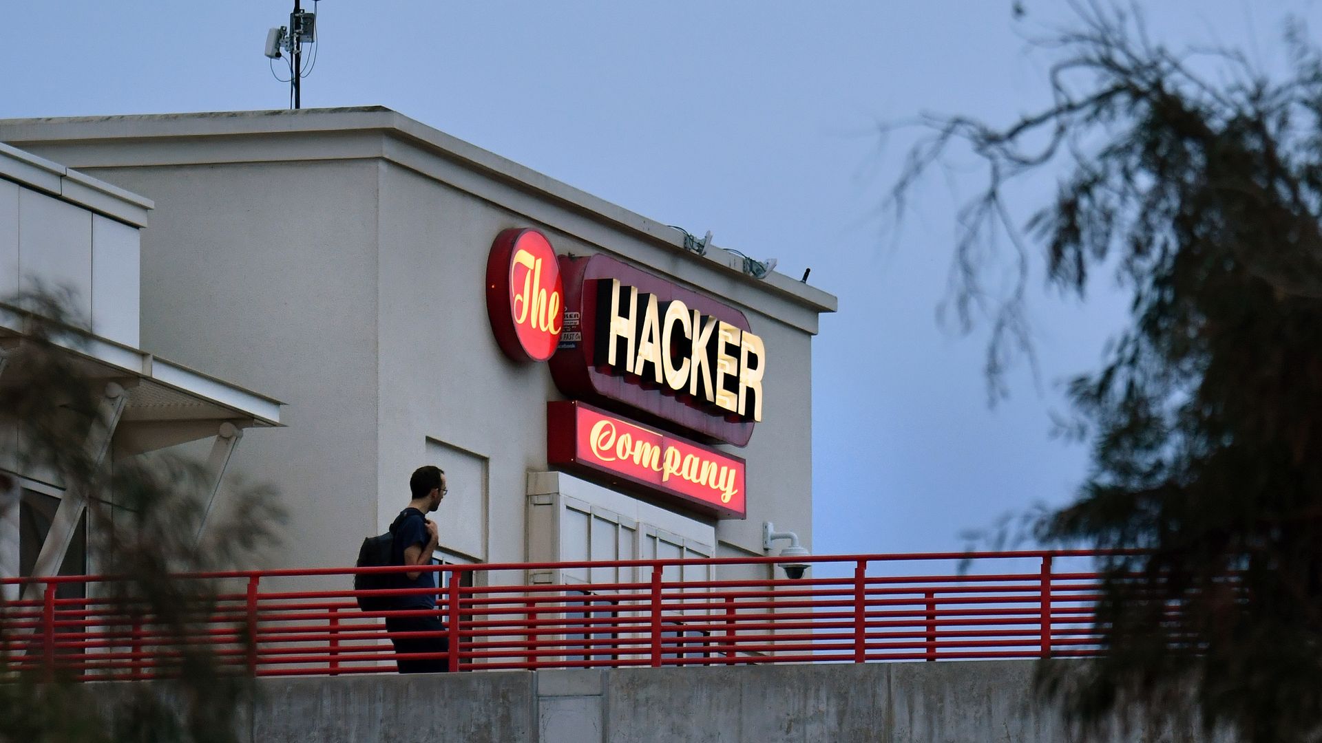 A sign at Facebook HQ reads "The Hacker Company"