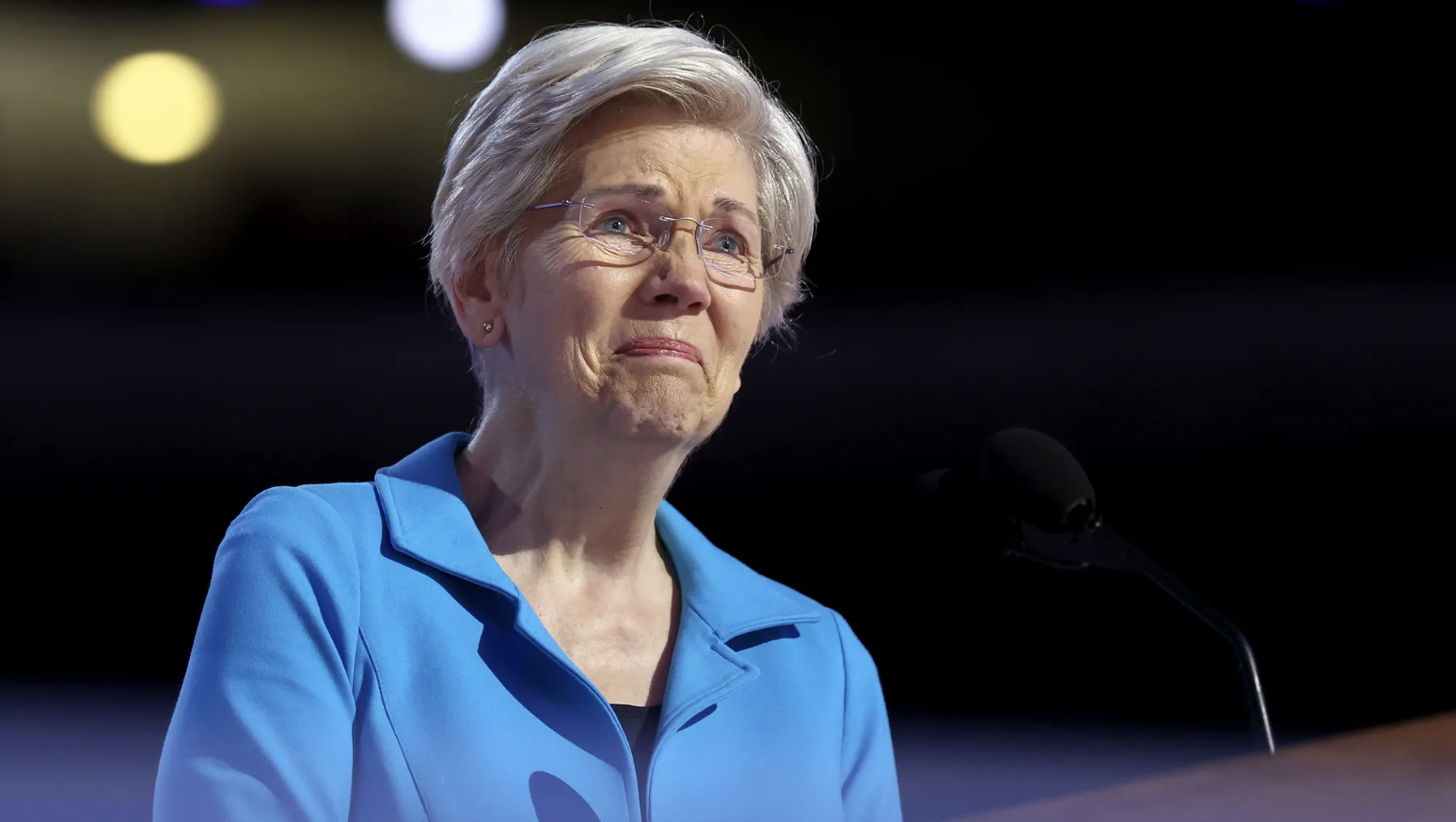 Sen. Elizabeth Warren becomes emotional as she receives an ovation from the crowd while arriving on stage to speak during the final day of the Democratic National Convention at the United Center on Aug. 22 in Chicago, Illinois.