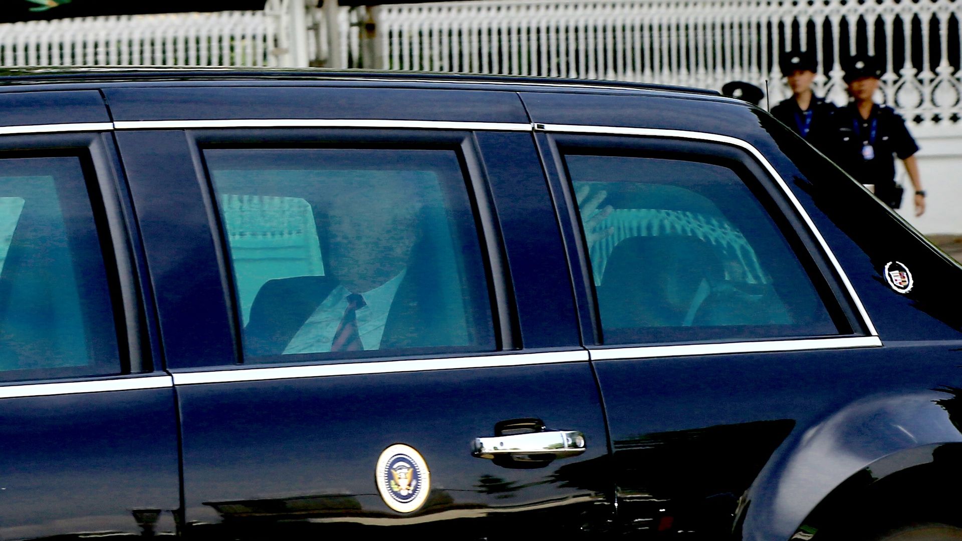 Trump in the backseat of a limo