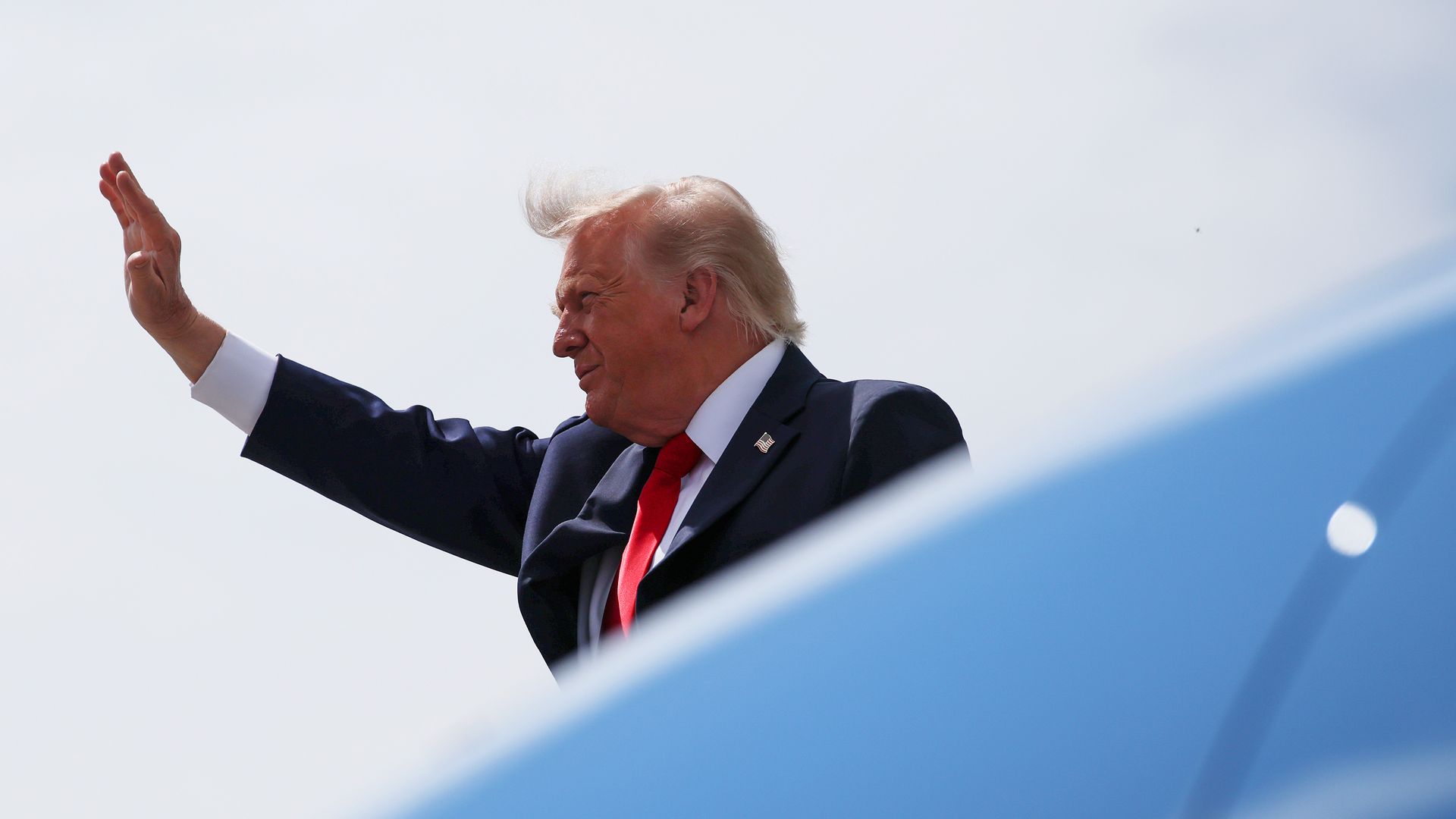 President Trump waves as he exits Air Force One on the tarmac at Chippewa Valley Regional Airport in Chippewa County, Wisconsin, ahead of an agriculture-focused event. Photo: Samuel Corum/Getty Images