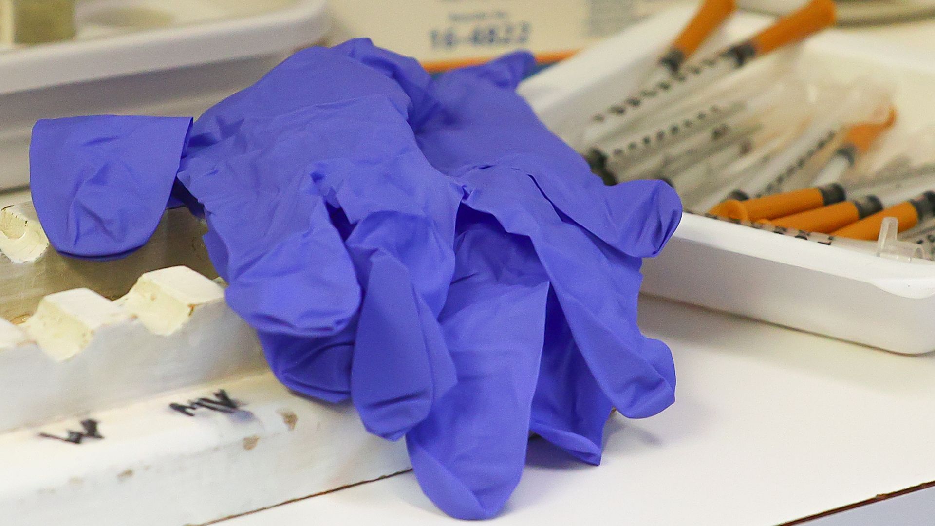 Exam gloves and syringes