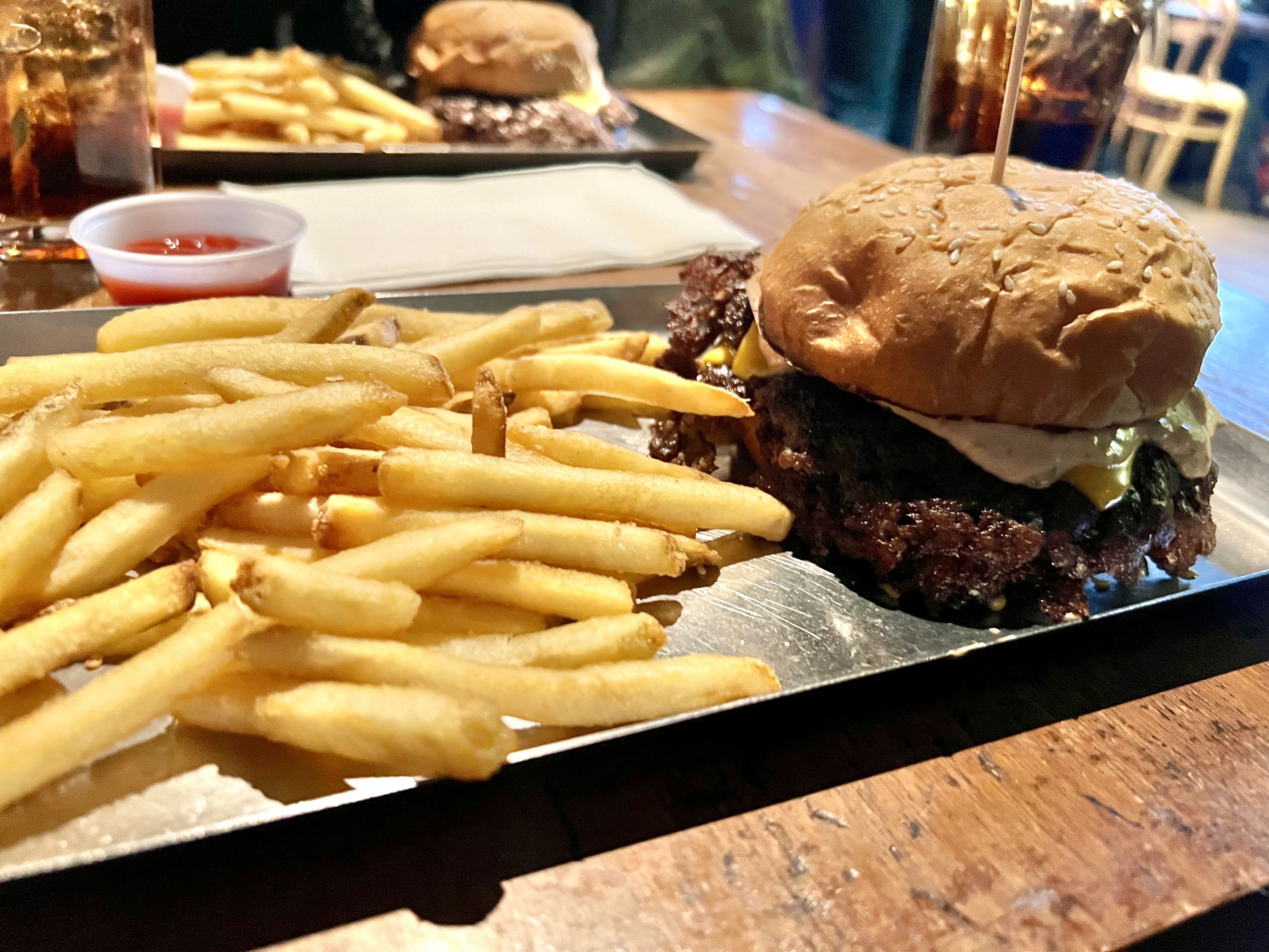 Photo of a cheeseburger and fries 