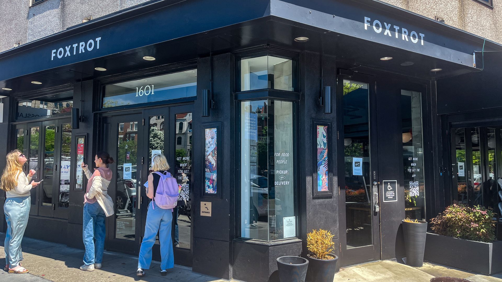 Confused shoppers stand in front of the Dupont Circle Foxtrot on April 23. 