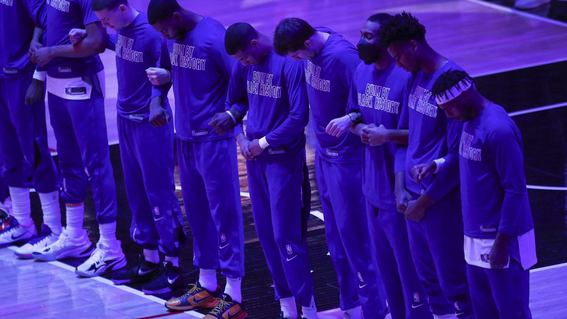  The Sacramento Kings linking arms during the national anthem in Los Angeles on Feb. 7.