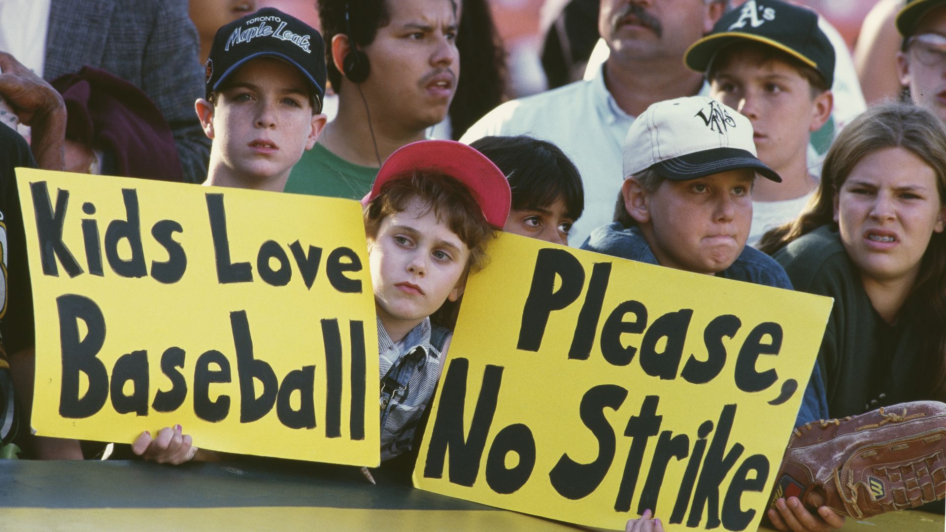 Kid holding signs