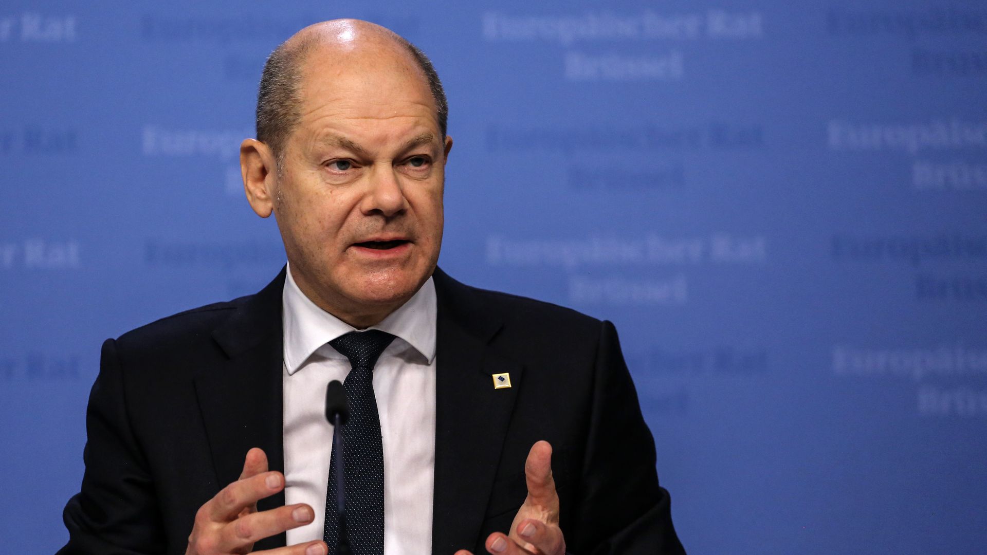 German Chancellor Olaf Scholz speaks at the European Council headquarters in Brussels.