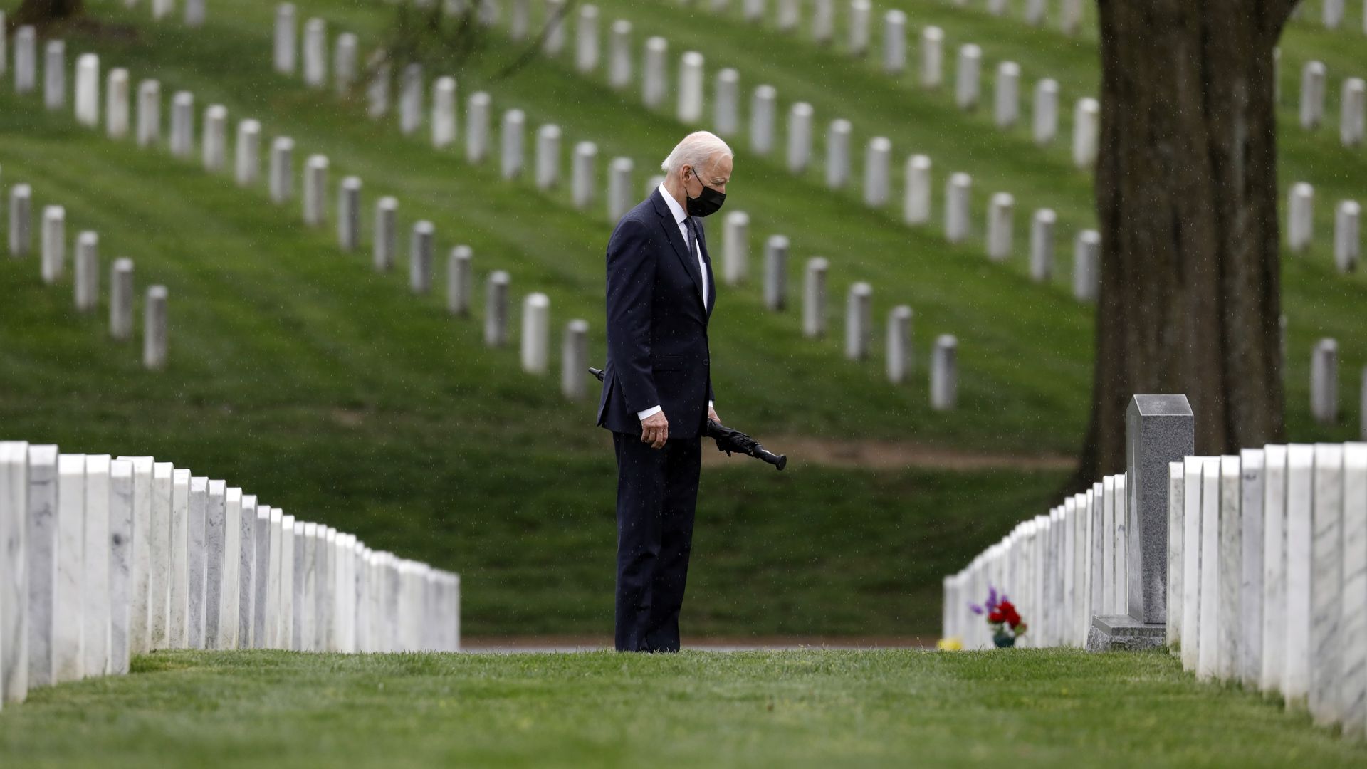 President Biden is seen standing amid the graves of armed forces members who died in Iraq and Afghanistan.