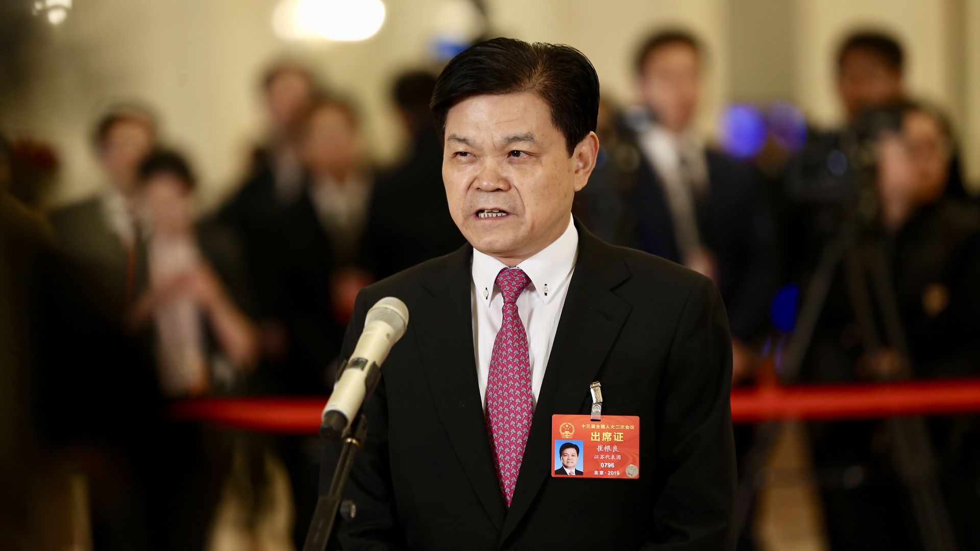 Hengtong Group Chairman Cui Genliang speaking at a microphone