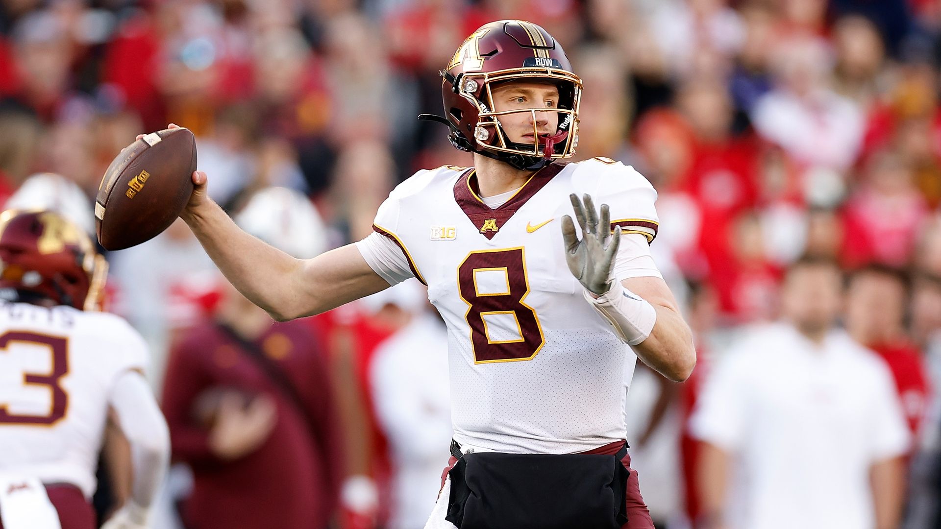 Athan Kaliakmanis throws a pass