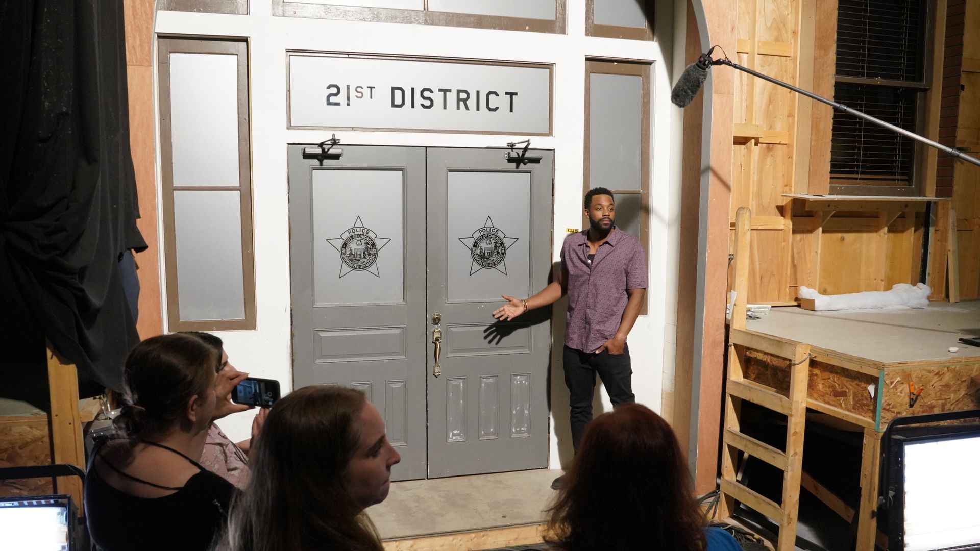 Guy on the set of a tv show 