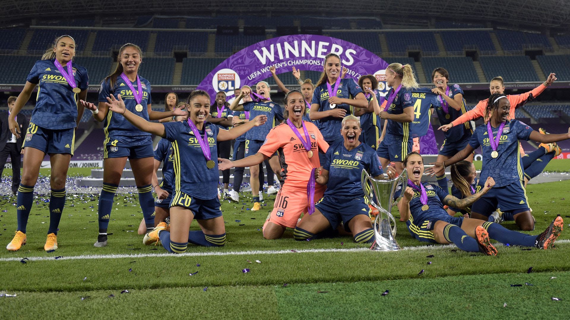 Lyon players celebrating.