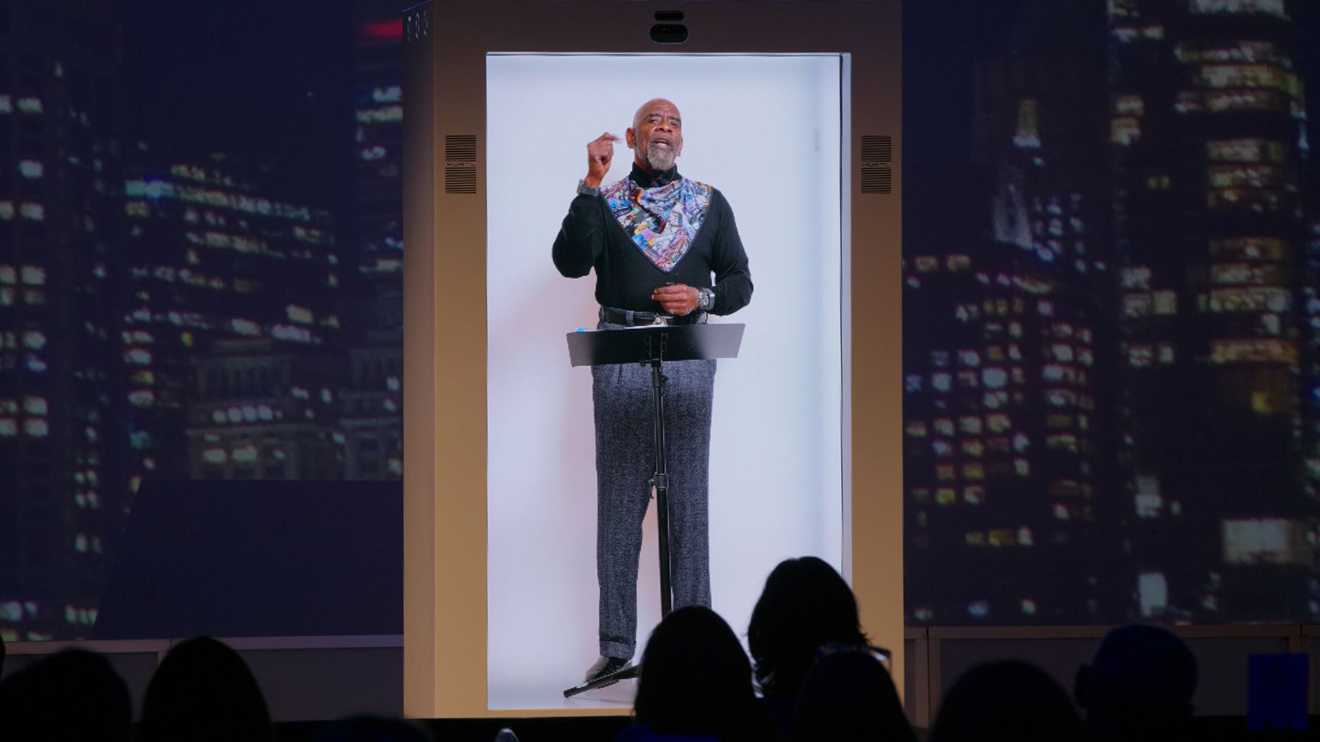 Chris Gardner, author of the memoir "The Pursuit of Happyness," appears in a PORTL booth as a motivational speaker.