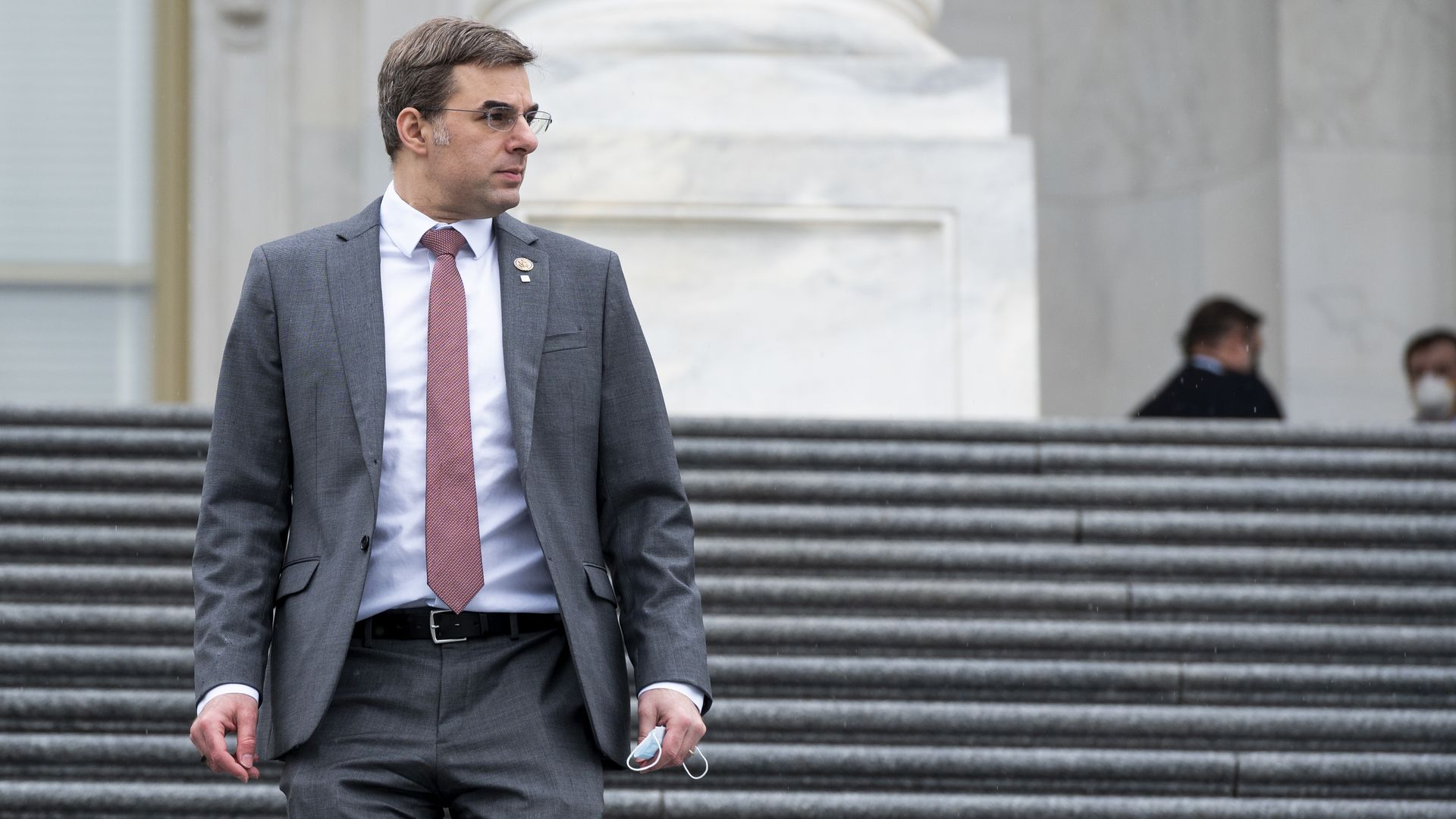 Justin Amash stands at the Capitol in this image
