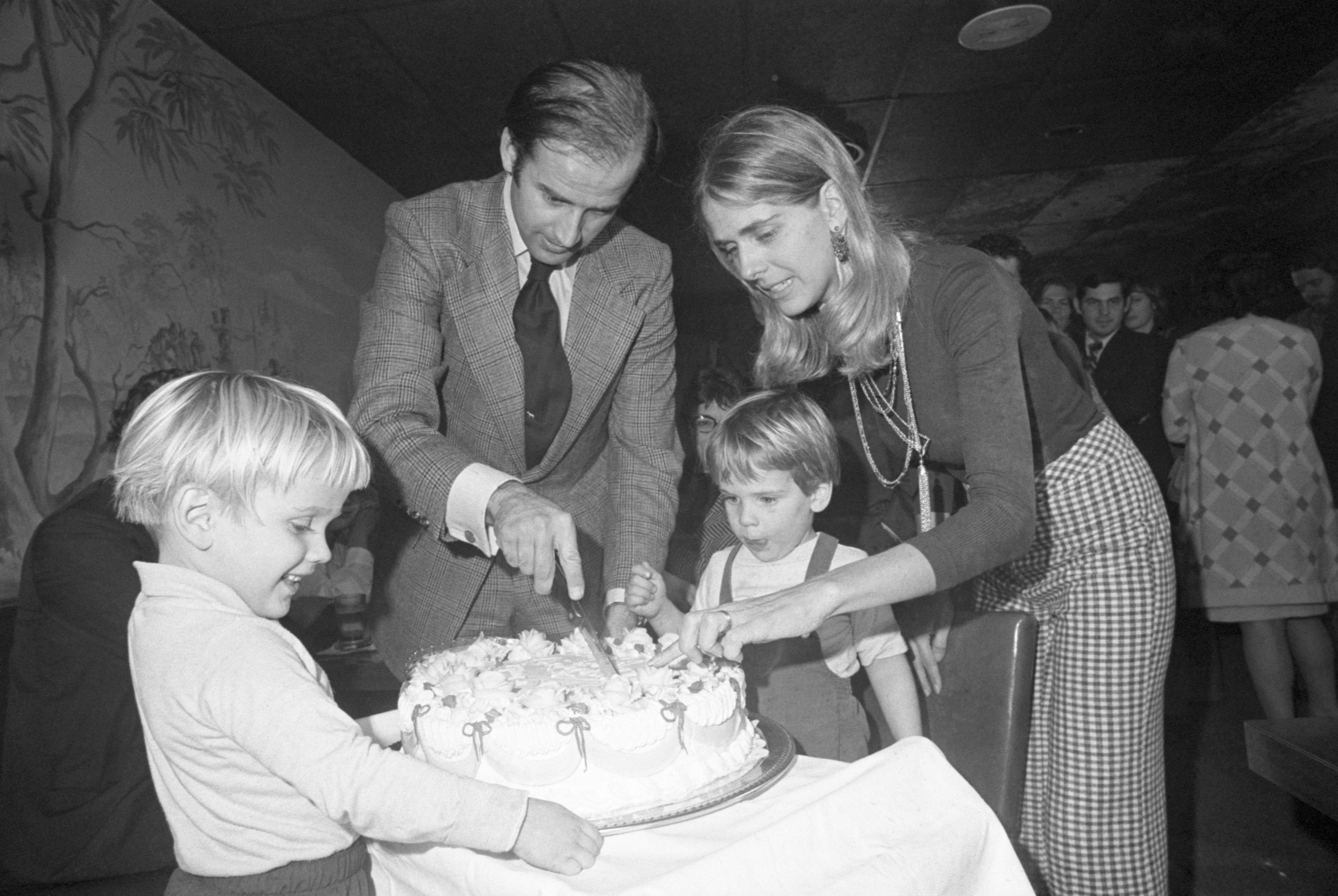 enator-elect Joseph Biden and wife Nelia cut his 30th birthday cake at a party in Wilmington, November 20th. His son, Hunter waits for the first piece. Biden by becoming 30 fulfills the constitutional requirement of Senators being 30 years of age when they take office.