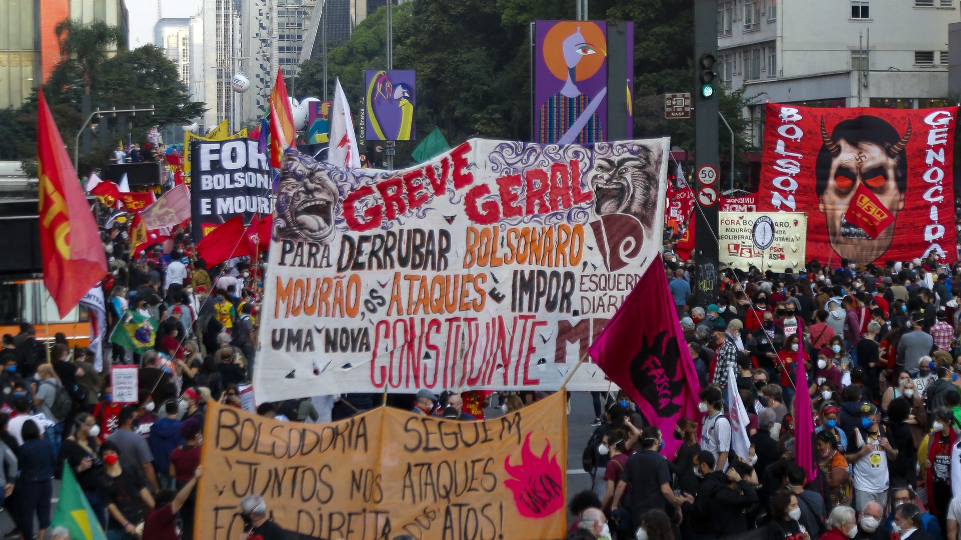 People take part in a demonstration against the Brazilian President Jair Bolsonaro's handling of the COVID-19 pandemic in Sao Paulo, Brazil, on July 3, 2021. 