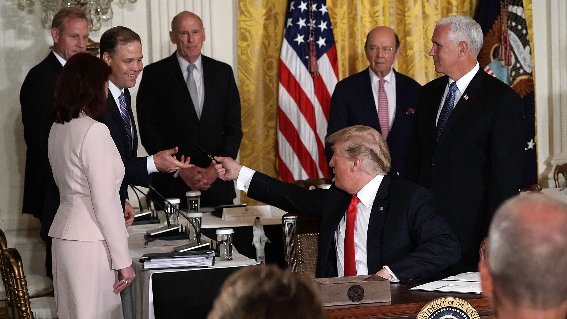 President Donald Trump shakes hands with NASA administrator Jim Bridenstine.