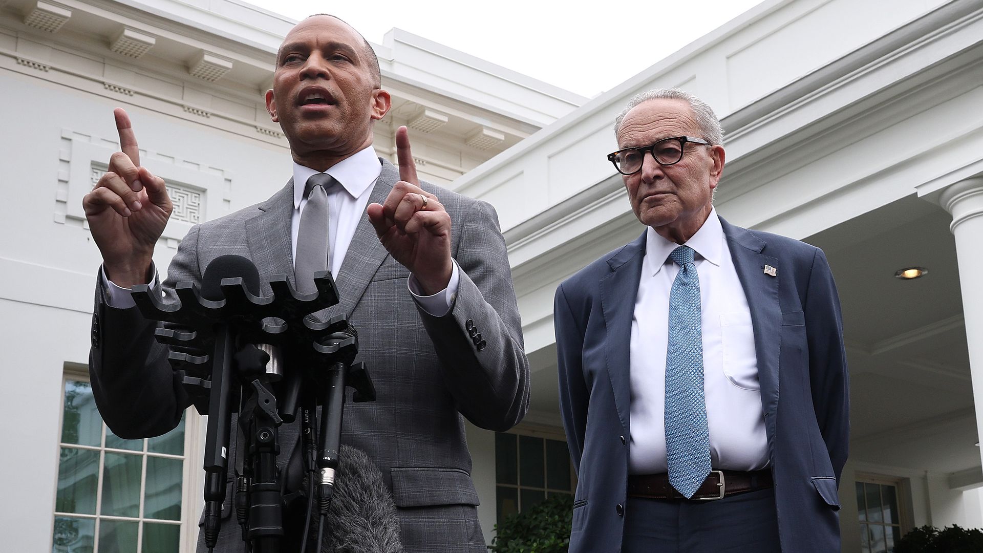 U.S. House Minority Leader Hakeem Jeffries (D-NY) (L) and Senate Minority Leader Charles Schumer (D-NY) deliver remarks following a meeting with U.S. President Donald Trump at the White House on September 29, 2025 in Washington, DC.